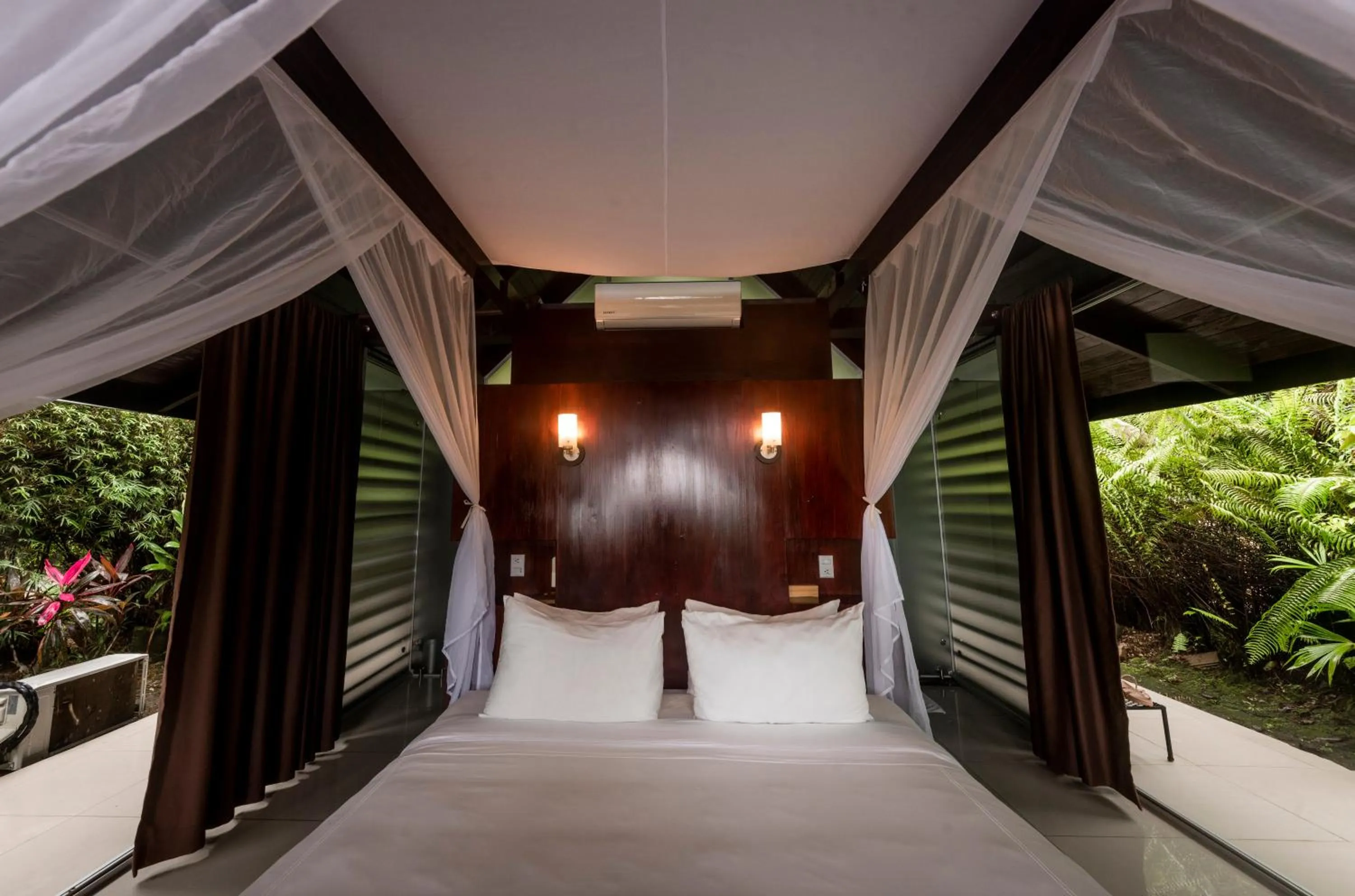 Bed in Oxygen Jungle Villas & Spa