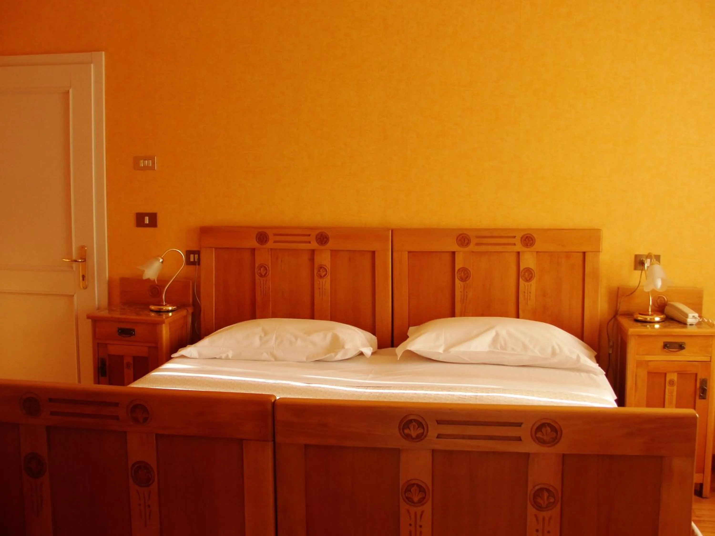 Bed in Hotel du Lac Parc & Residence