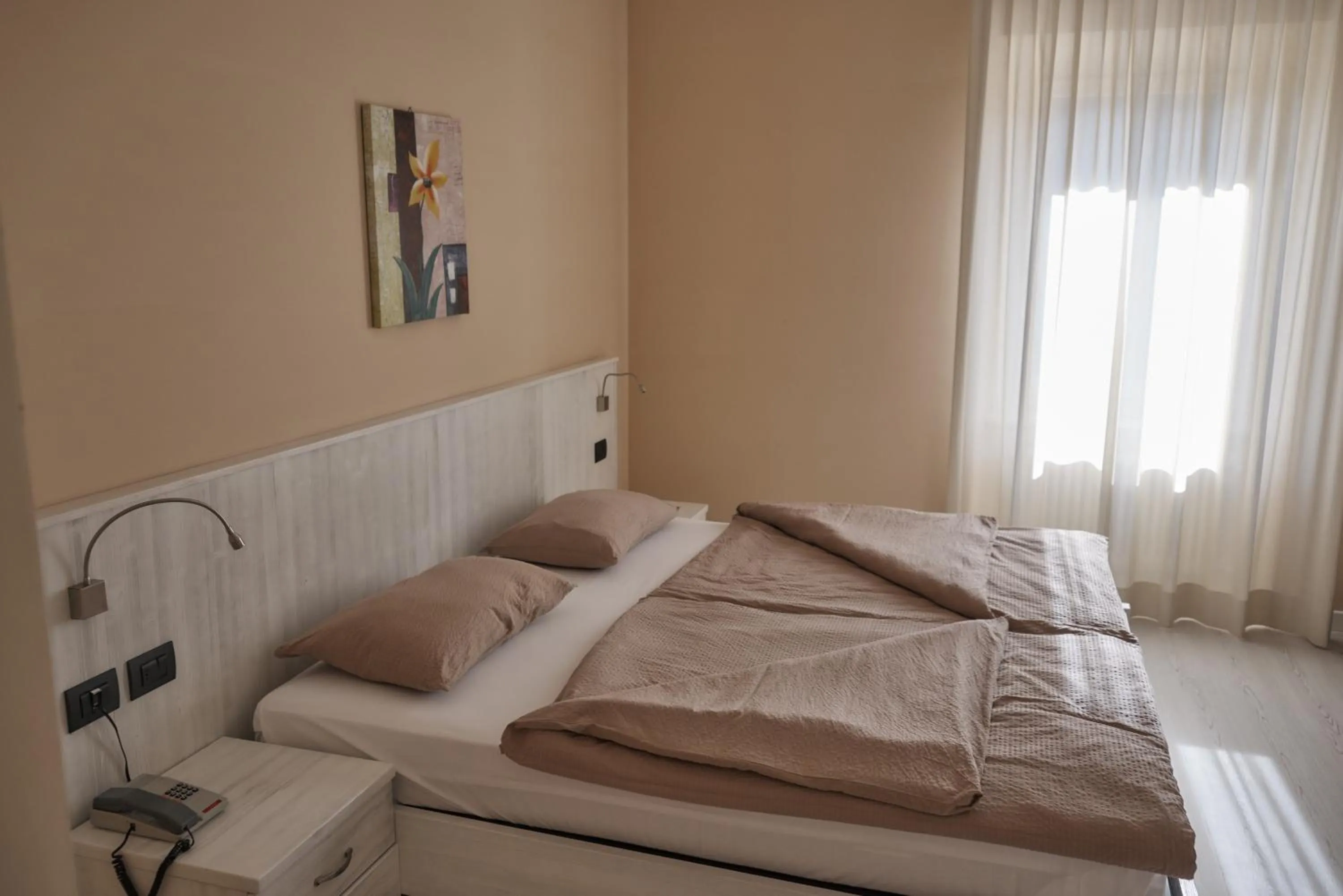 Bed in Hotel du Lac Parc & Residence