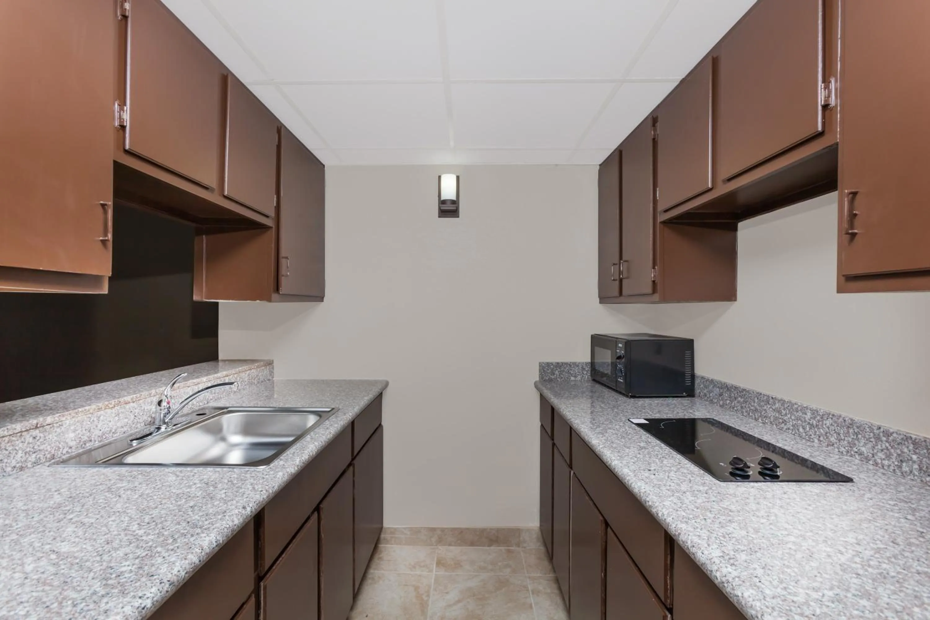 Kitchen or kitchenette in Super 8 by Wyndham Buffalo