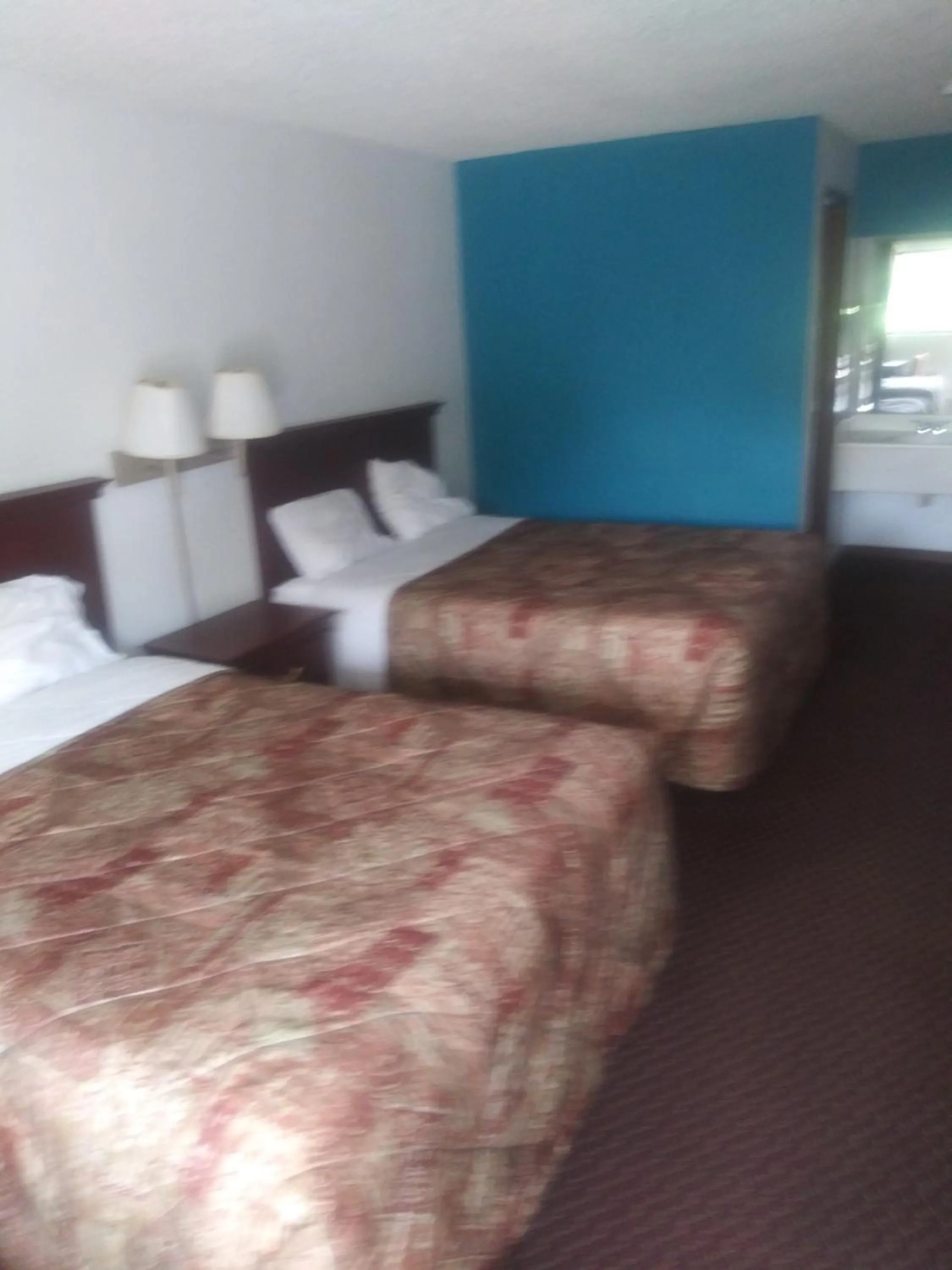 Property building, Bed in Rodeway Inn Jonesboro - Atlanta South