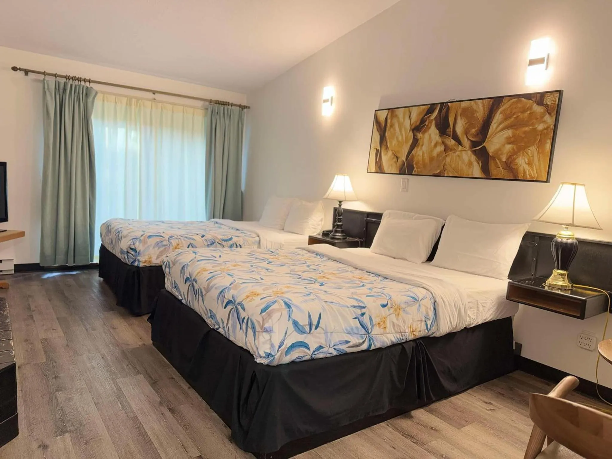 Bed in Sunshine Lodge Inn