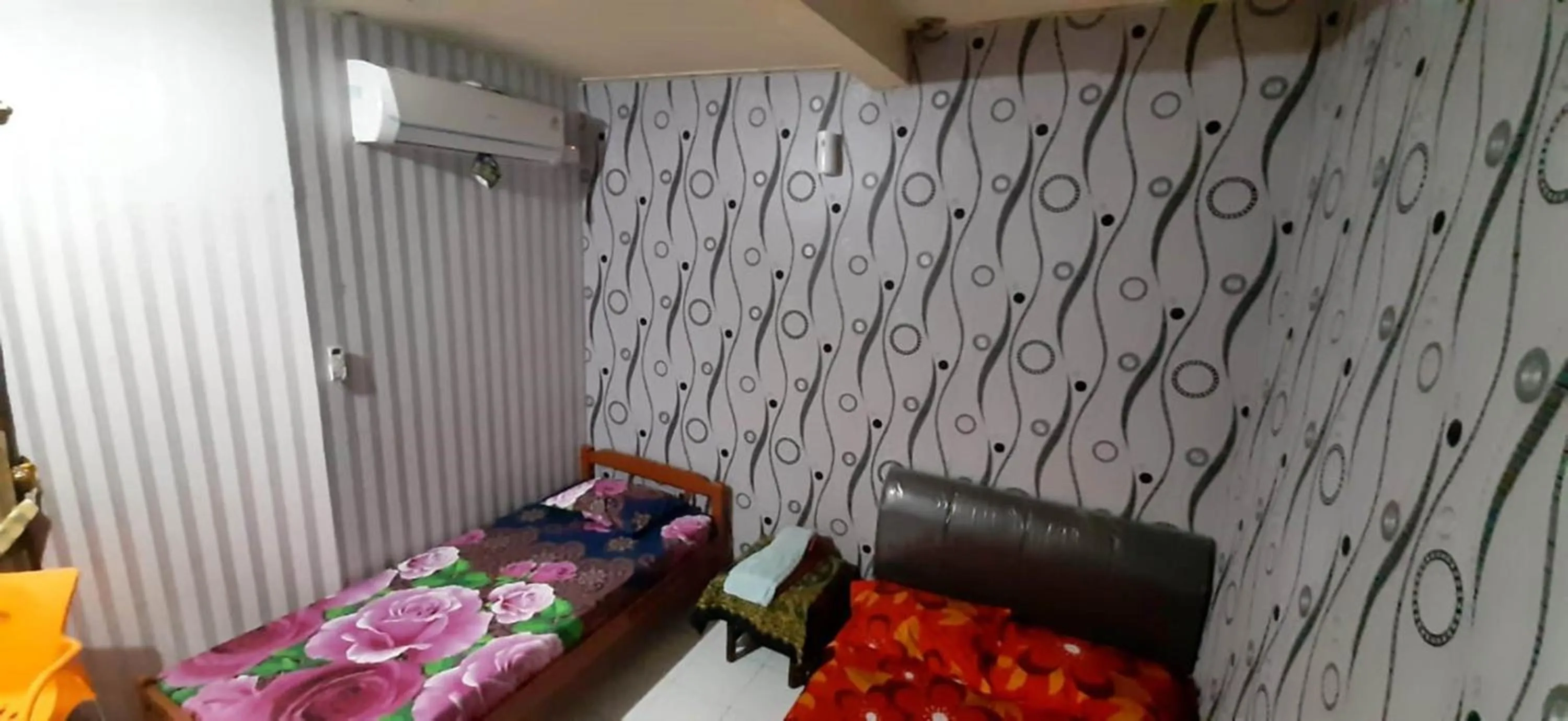 Bed in Dharmawati Homestay Syariah at Terminal Purabaya