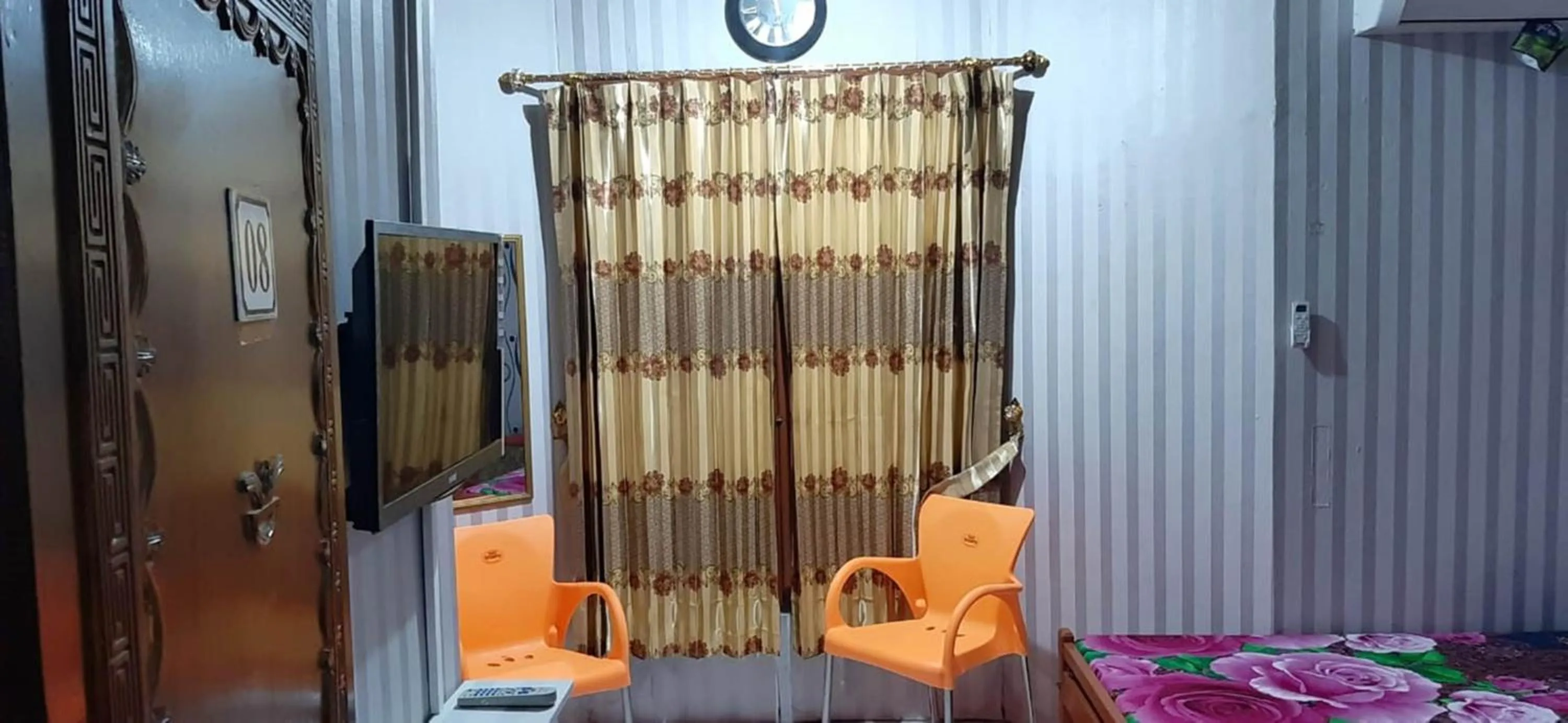 Seating area in Dharmawati Homestay Syariah at Terminal Purabaya