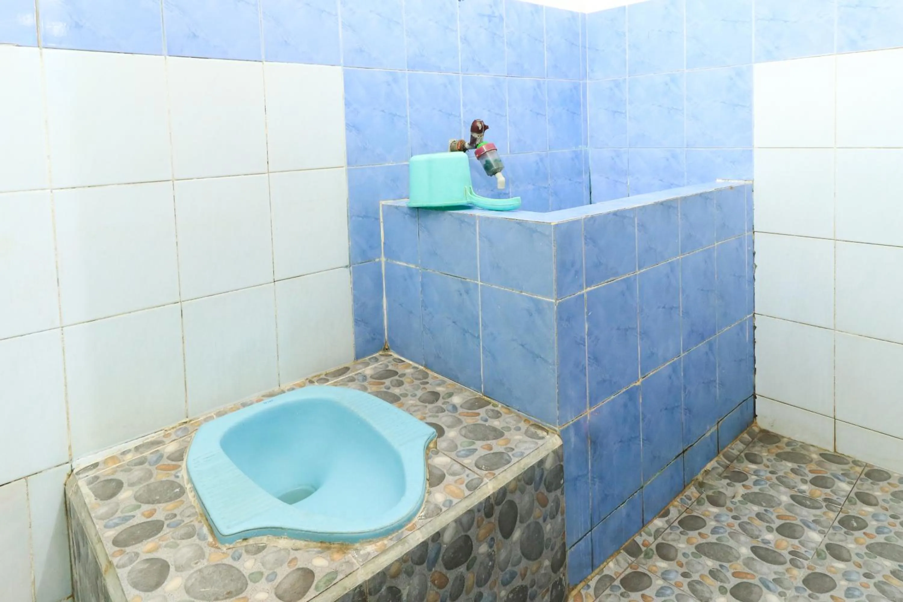 Bathroom in Dharmawati Homestay Syariah at Terminal Purabaya