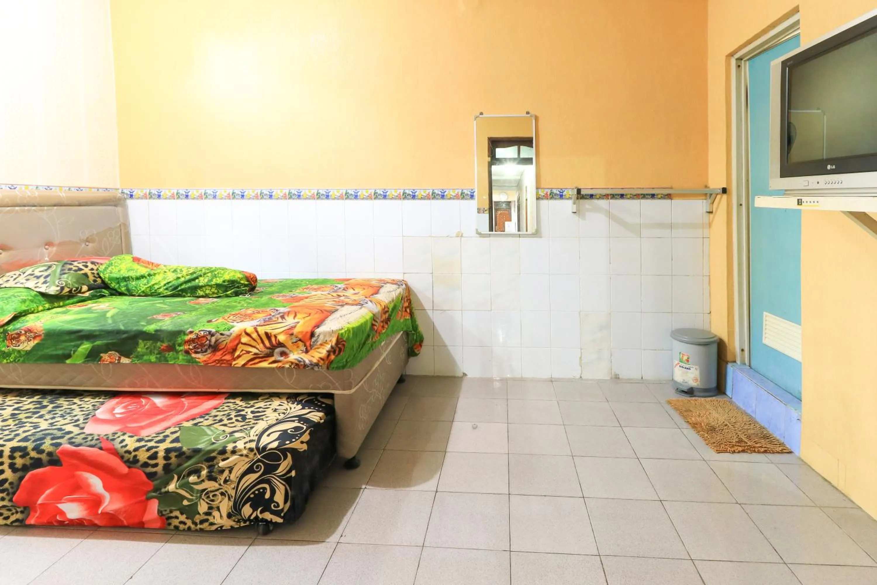 Bedroom, Bed in Dharmawati Homestay Syariah at Terminal Purabaya