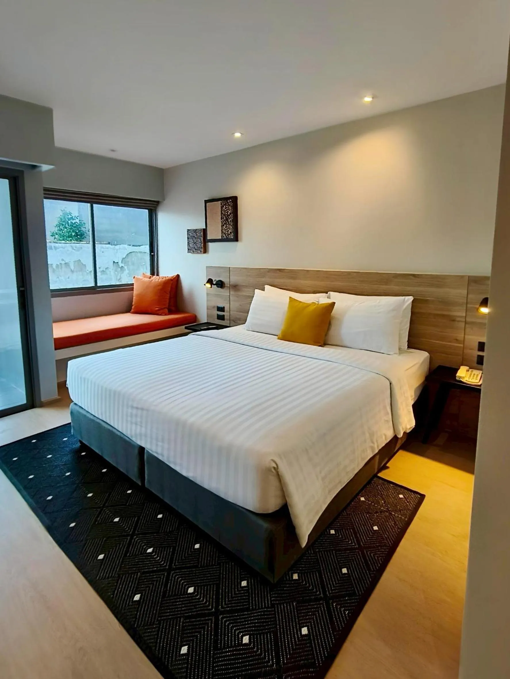 Bed in Beehive Boutique Hotel Phuket