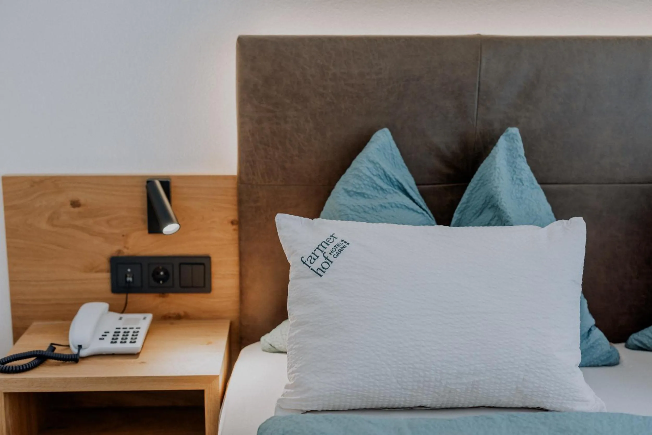 Bed in Garni-Hotel Farmerhof