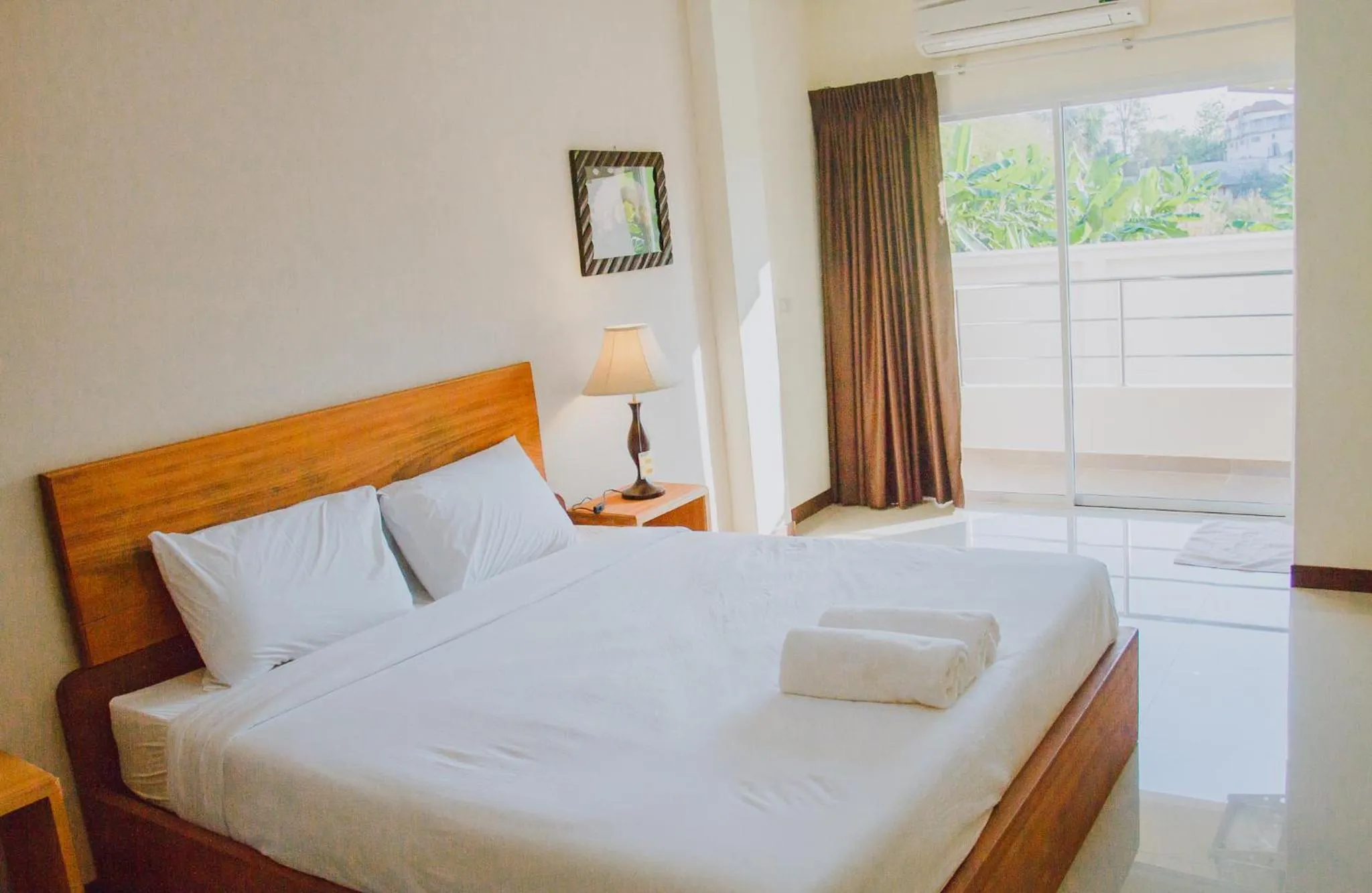 Photo of the whole room, Bed in Baan Kiang Wang