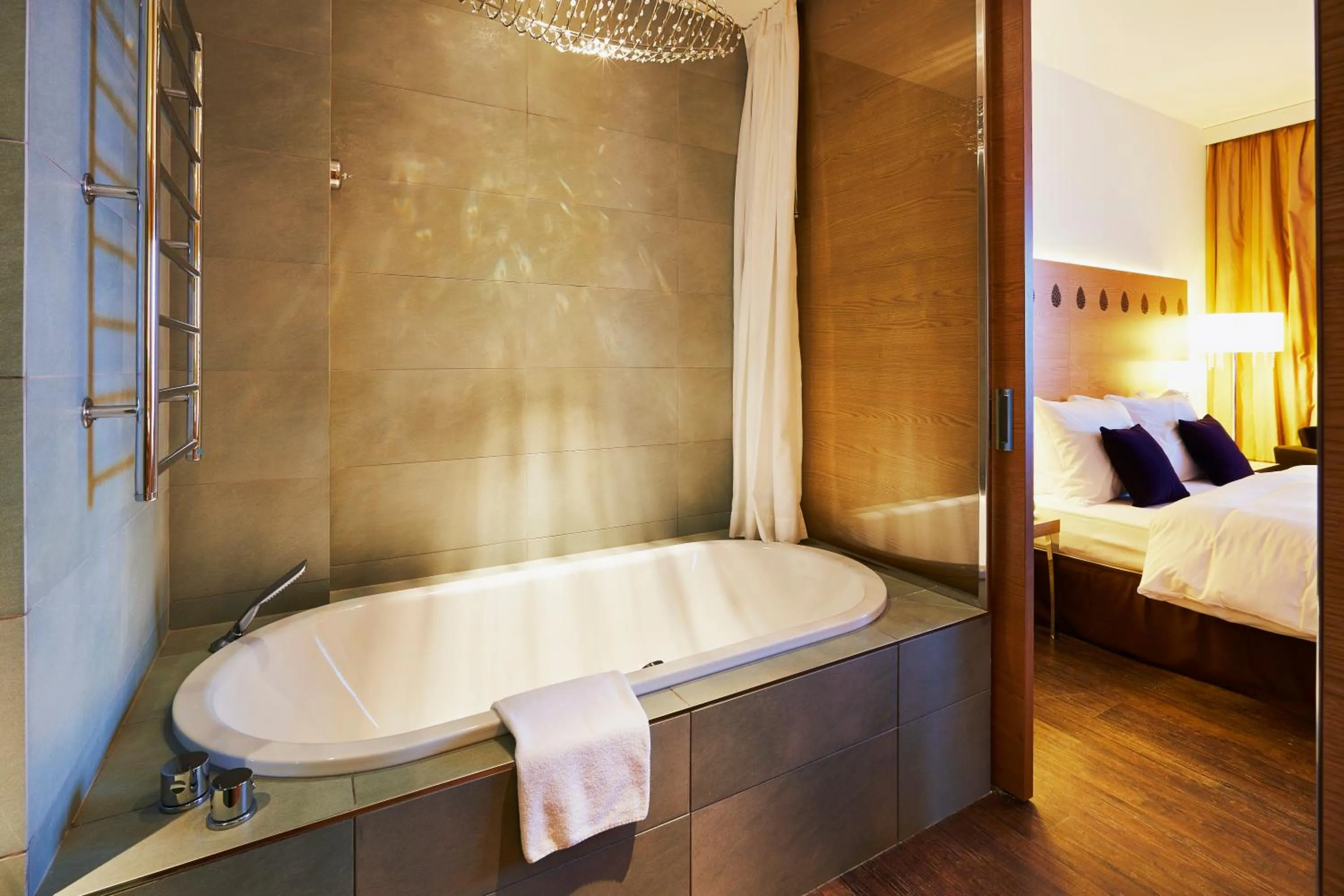 Bathroom, Bed in Radisson Blu Resort Bukovel