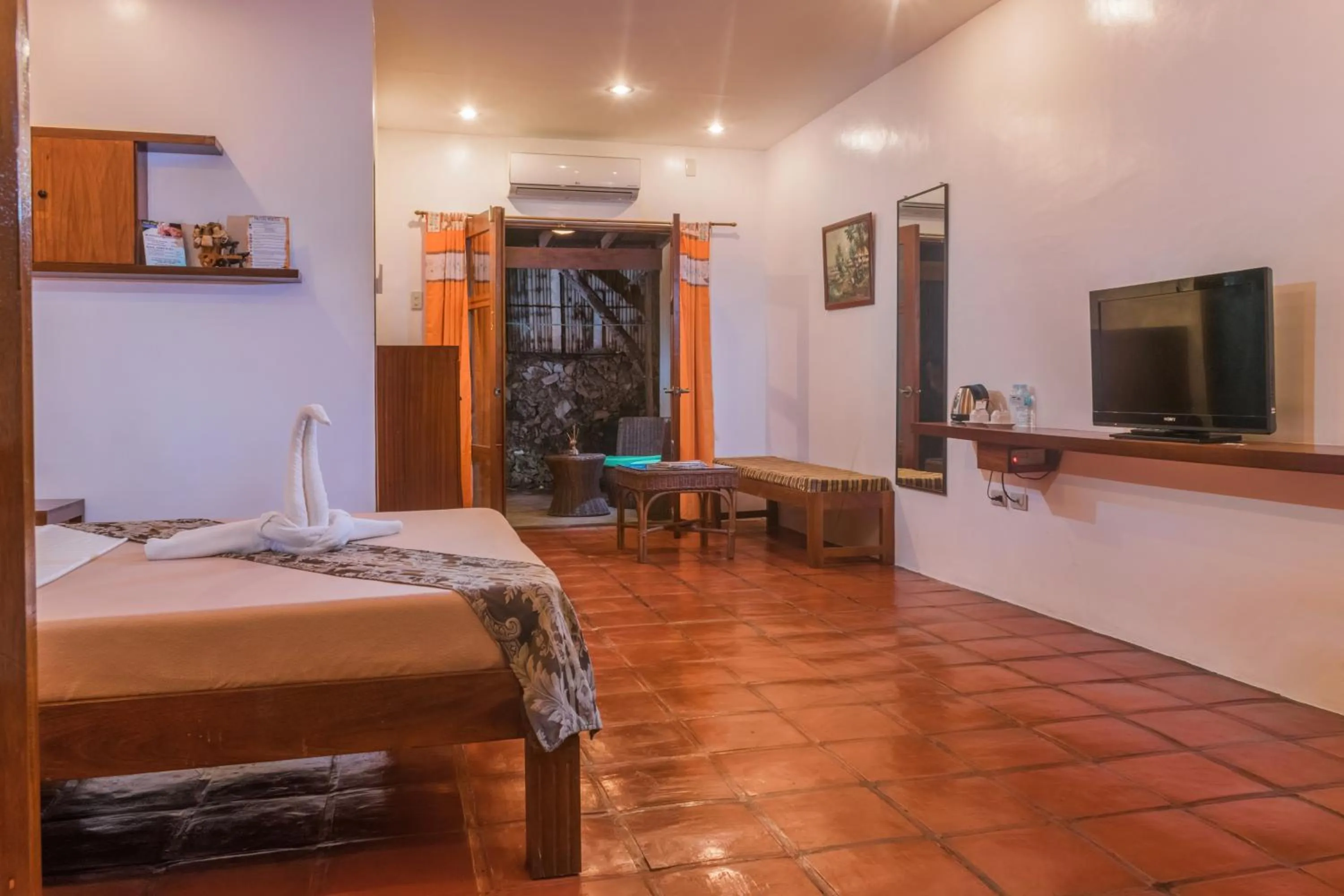 Bed in Acacia Tree Garden Hotel