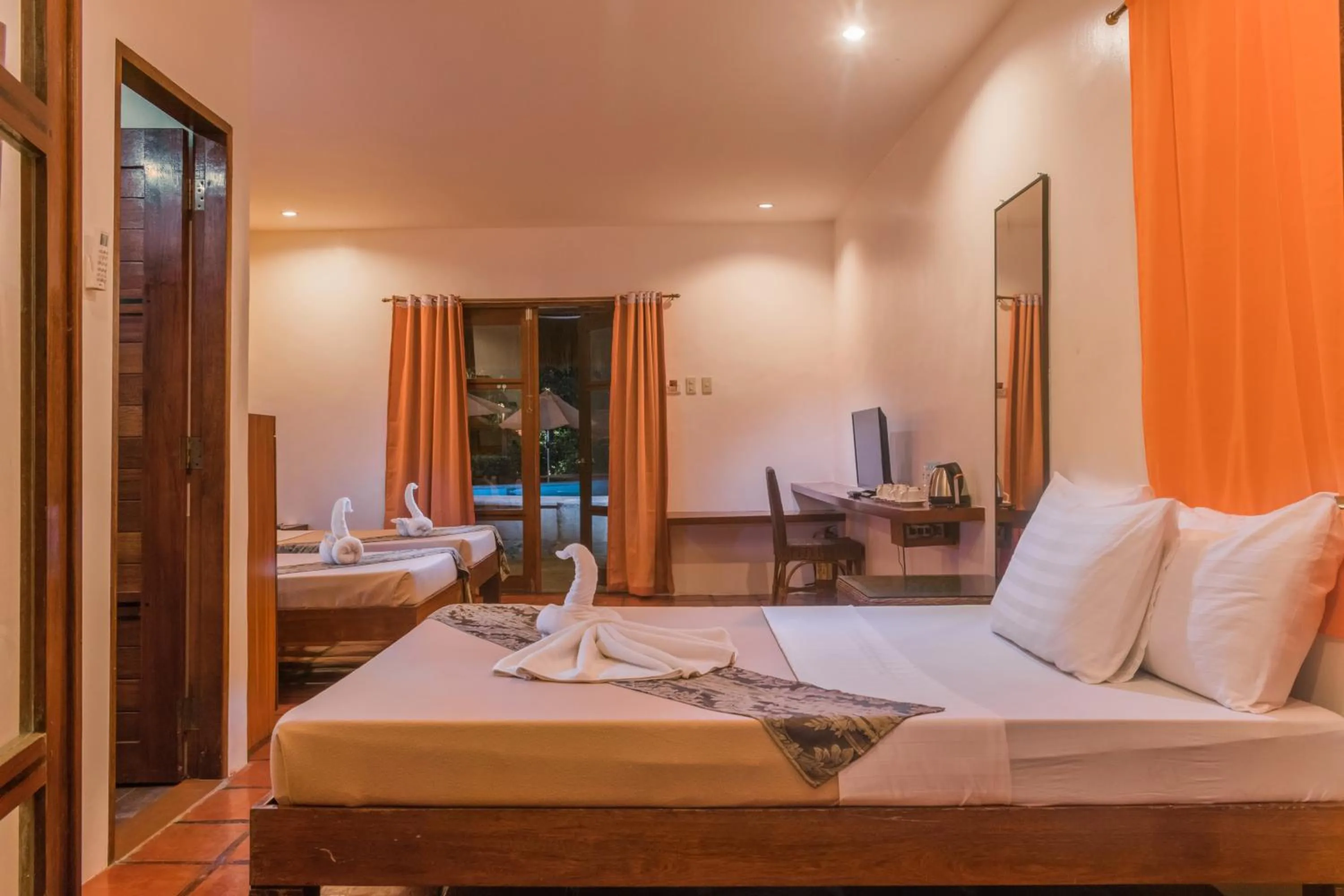 Bed in Acacia Tree Garden Hotel