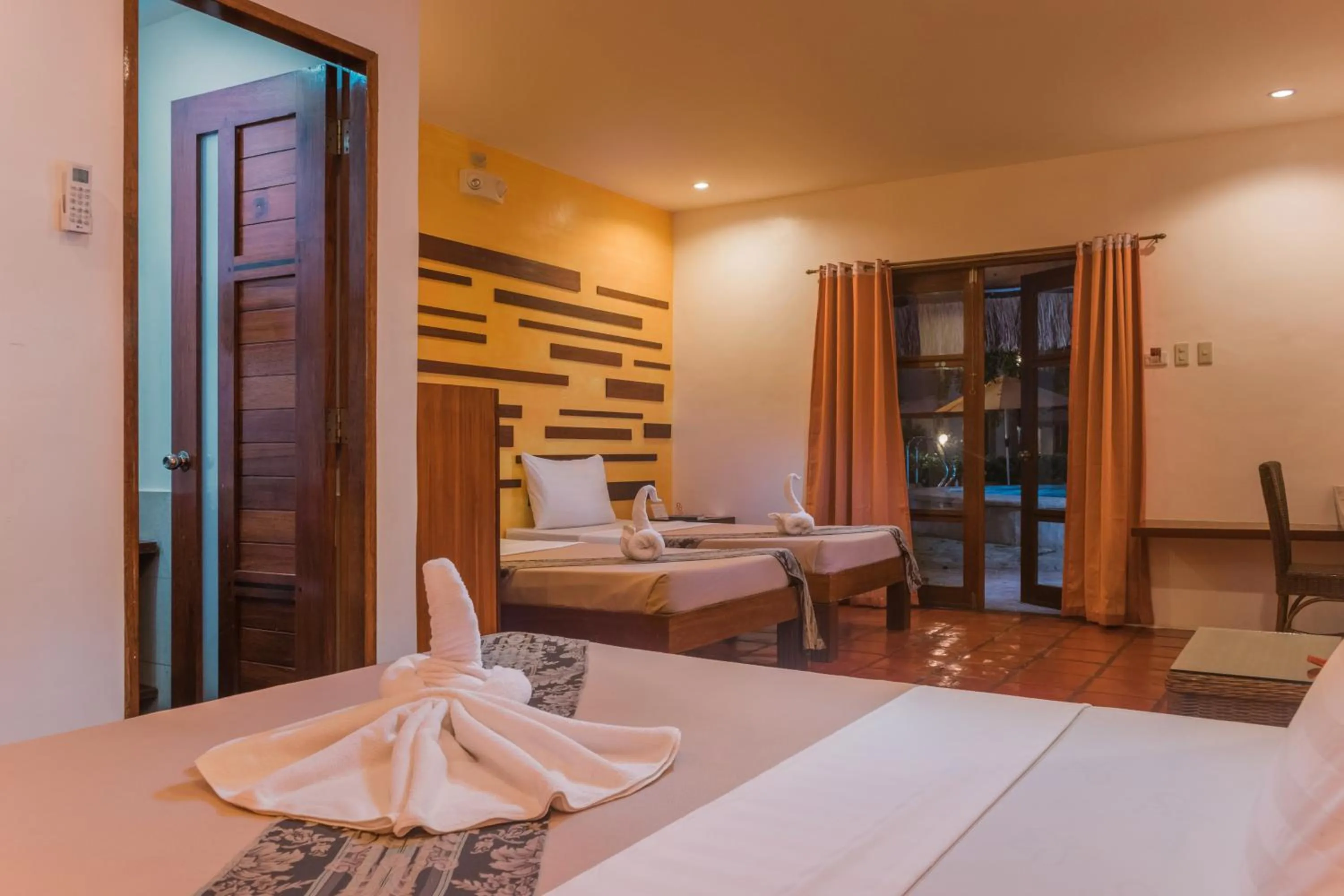 Bed in Acacia Tree Garden Hotel