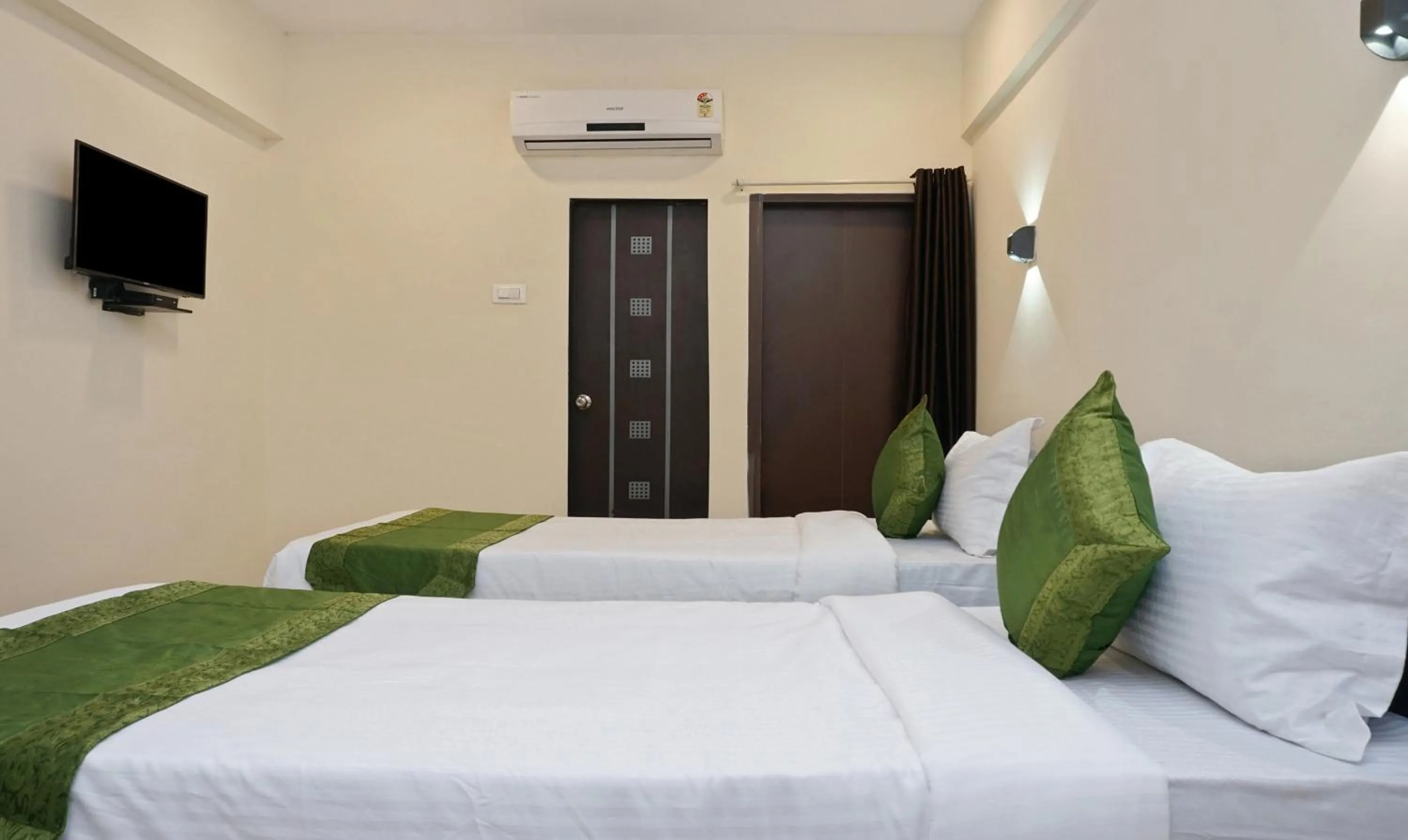 Bedroom, Bed in Treebo Lotus Baner