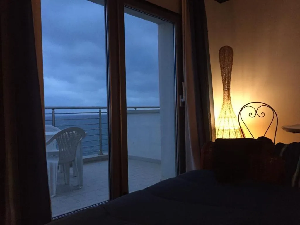 Bed in La Rosa dei Venti Resort