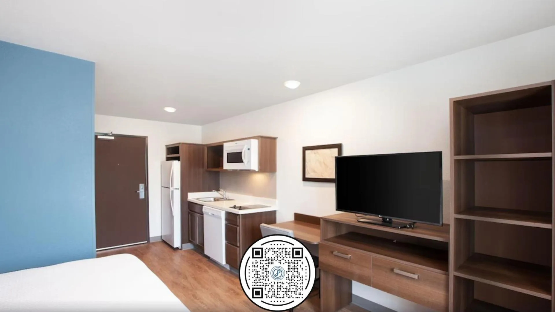 Bedroom in WoodSpring Suites Dallas Plano Central Legacy Drive