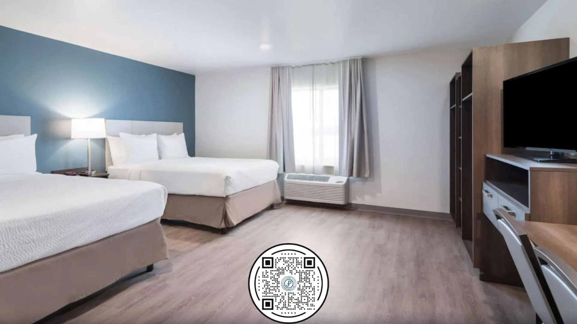 Bedroom, Bed in WoodSpring Suites Dallas Plano Central Legacy Drive