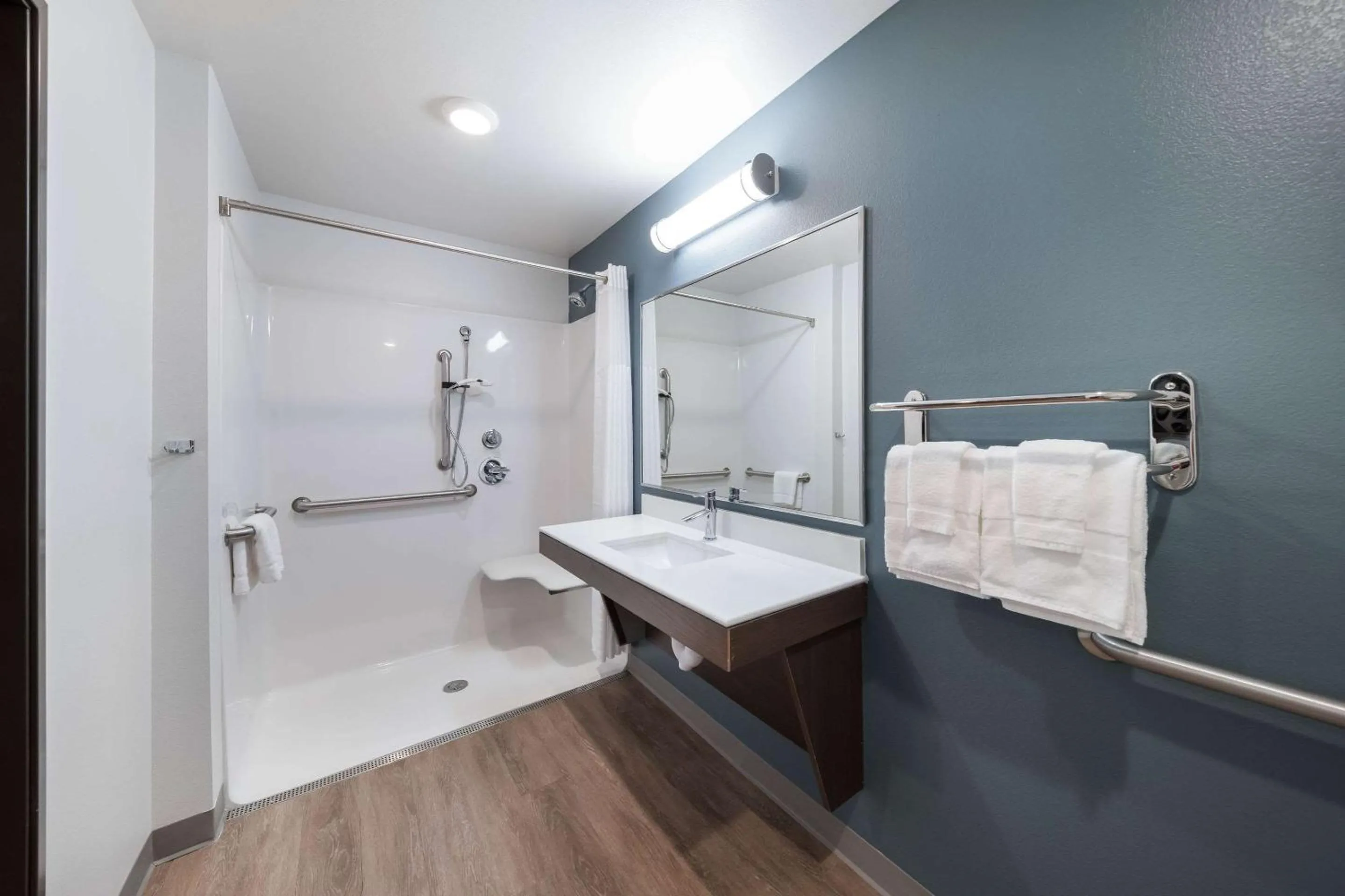 Bathroom in WoodSpring Suites Dallas Plano Central Legacy Drive