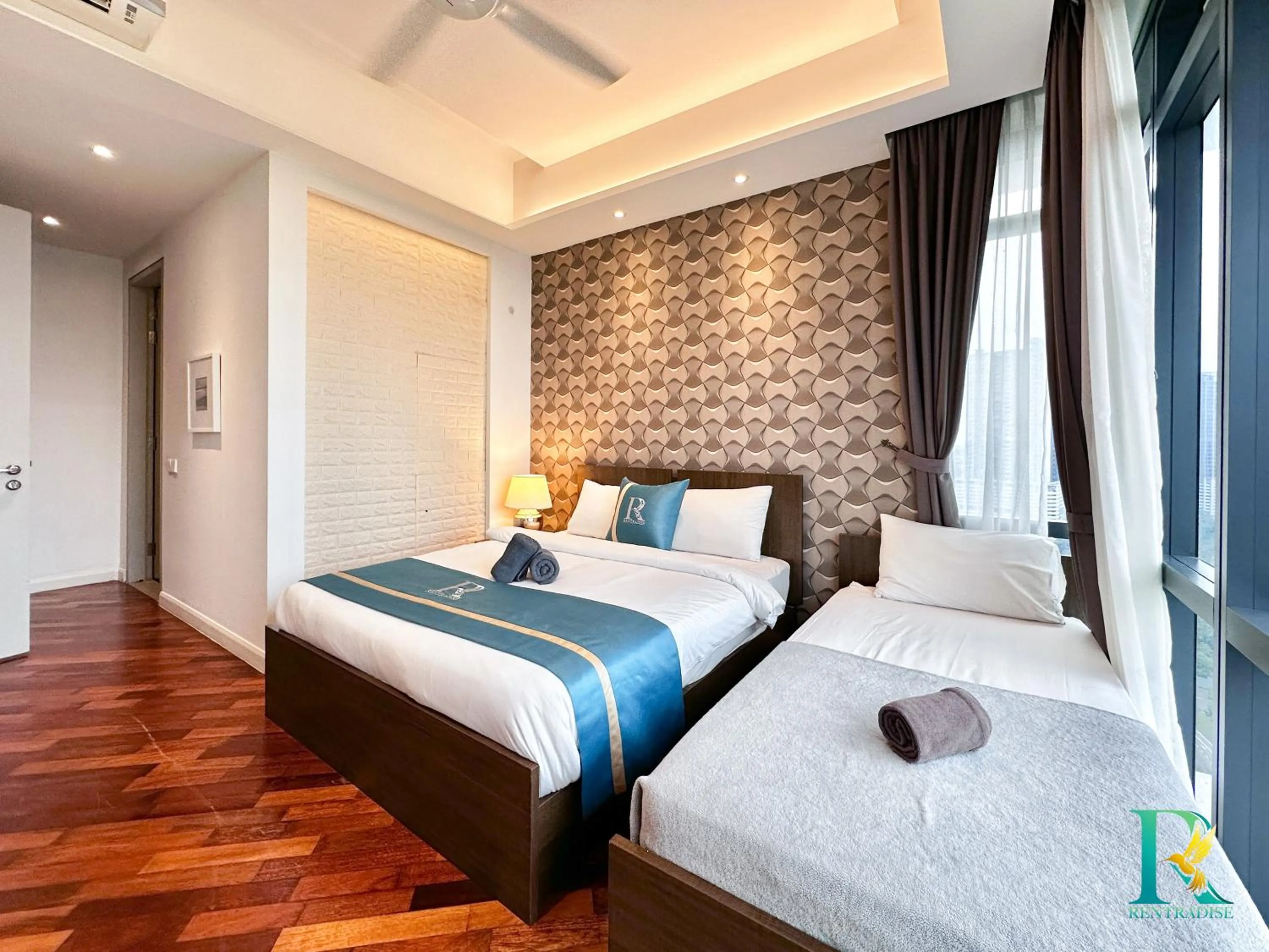 Bed in Grand Medini Suites by RR JBcity