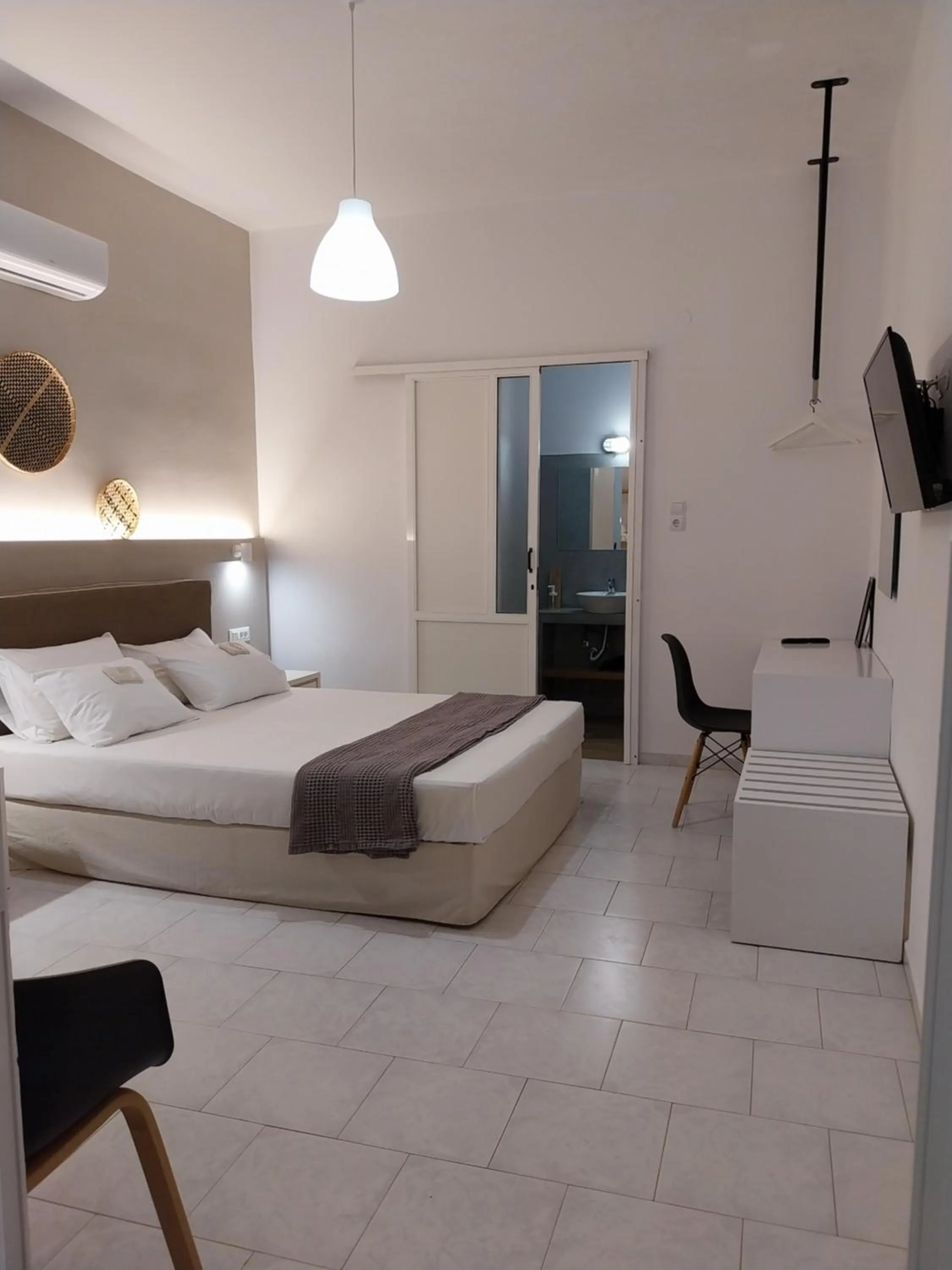 Bed in Galini Rooms & Apartments