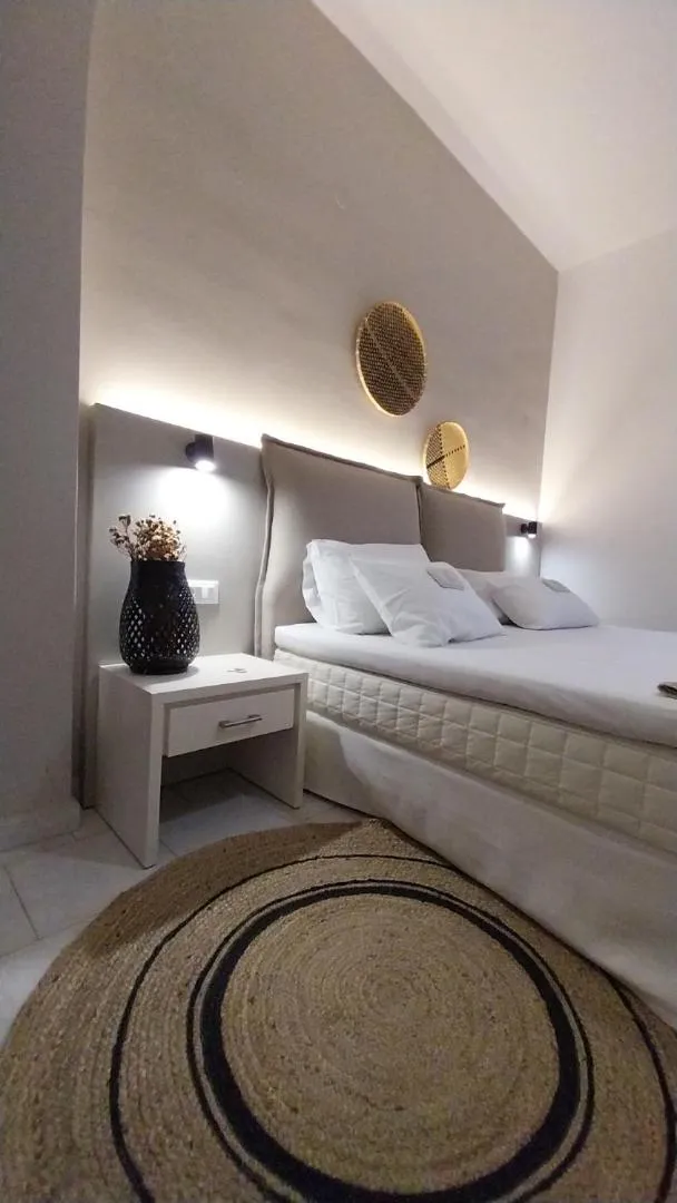 Bed in Galini Rooms & Apartments