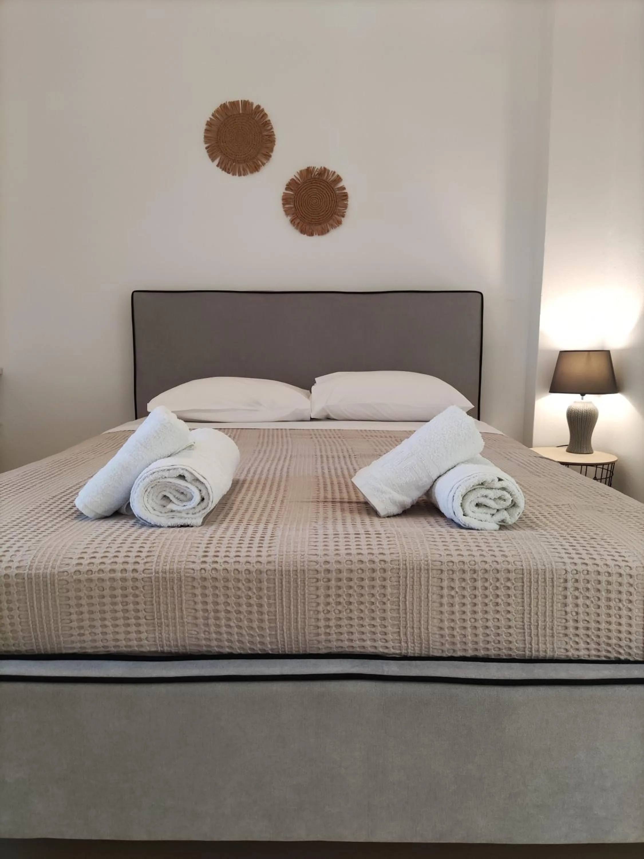 Bed in Galini Rooms & Apartments