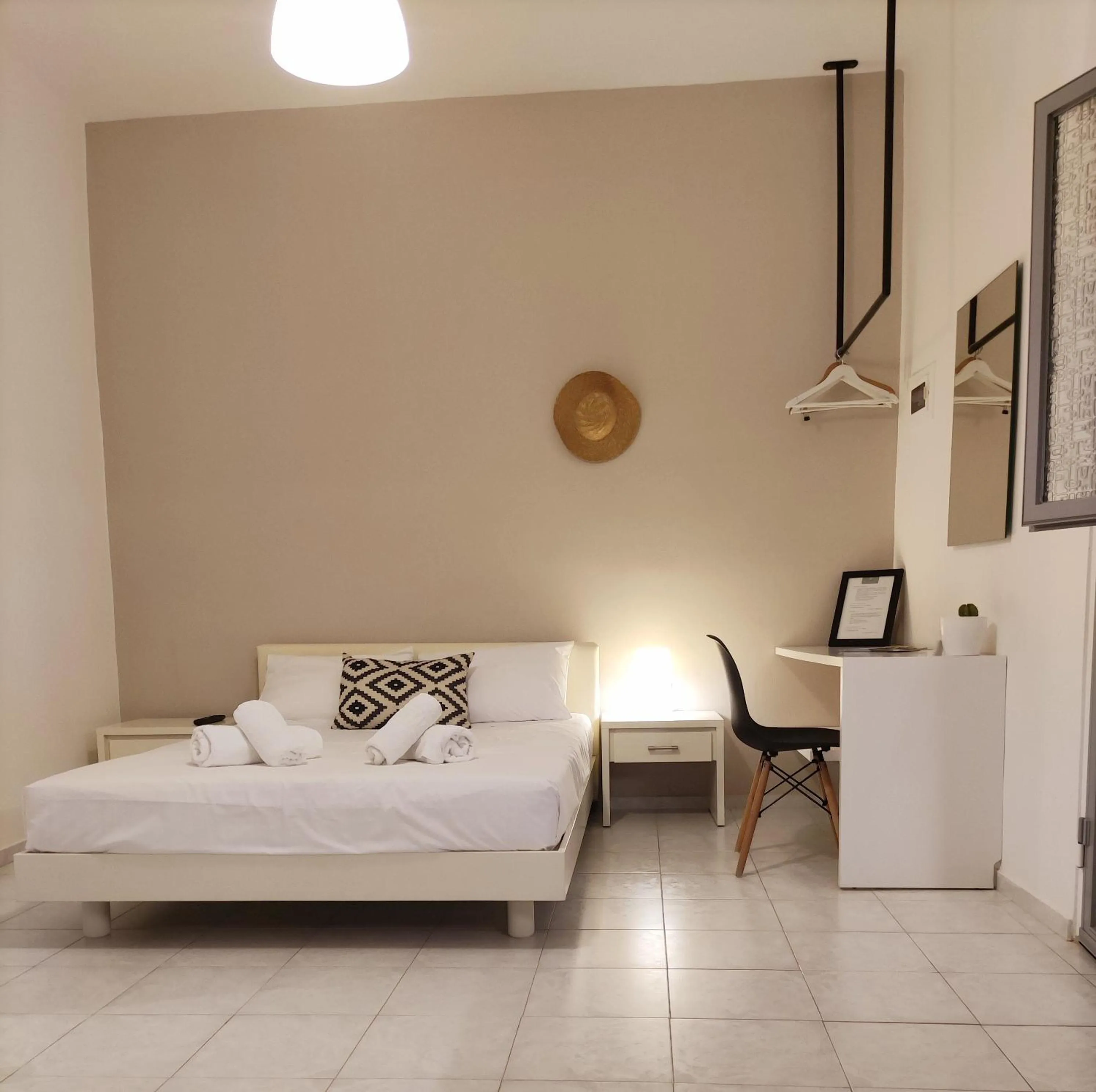 Bed in Galini Rooms & Apartments