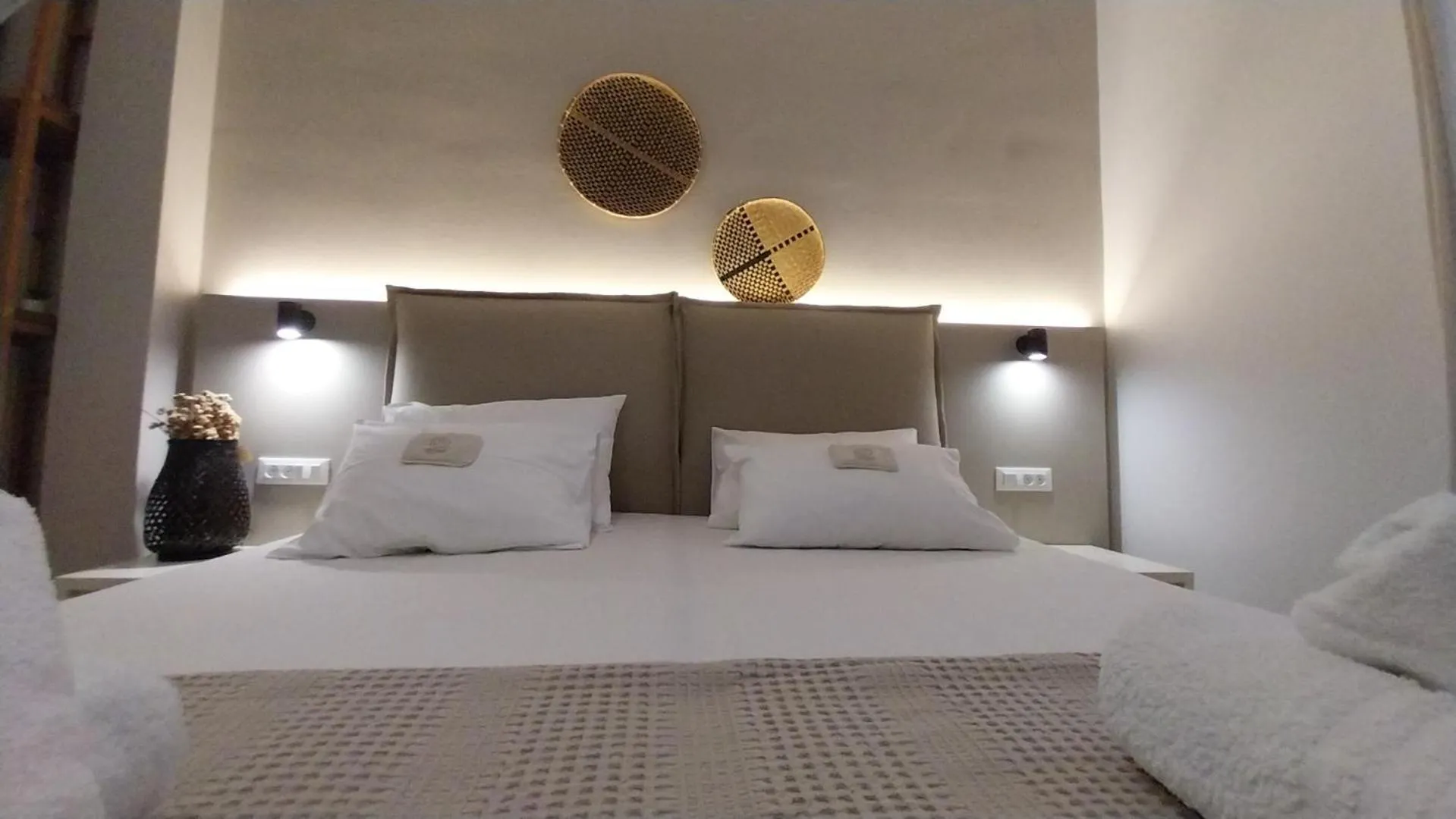 Bed in Galini Rooms & Apartments