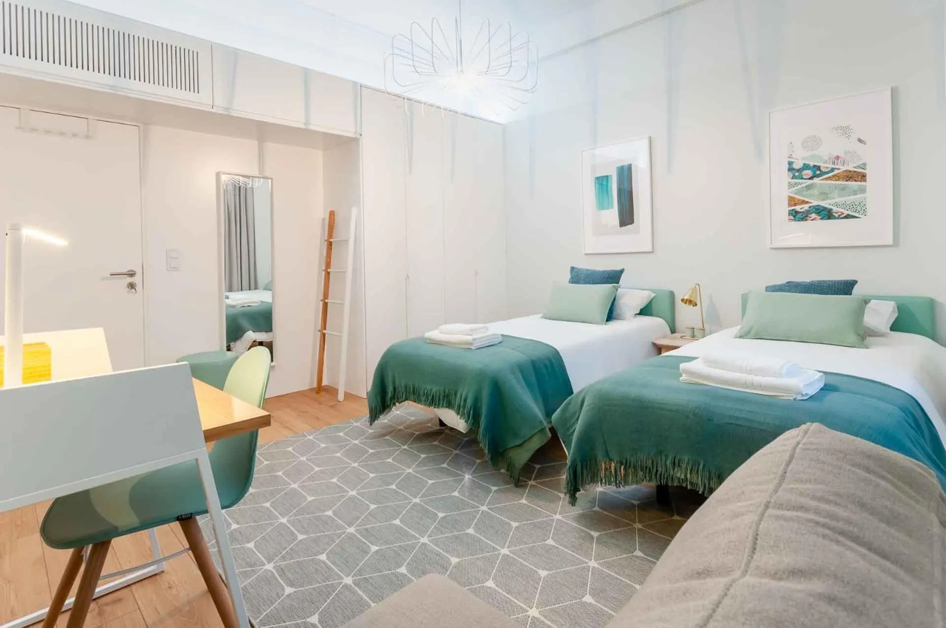 Bed in NLC Rooms & Suites