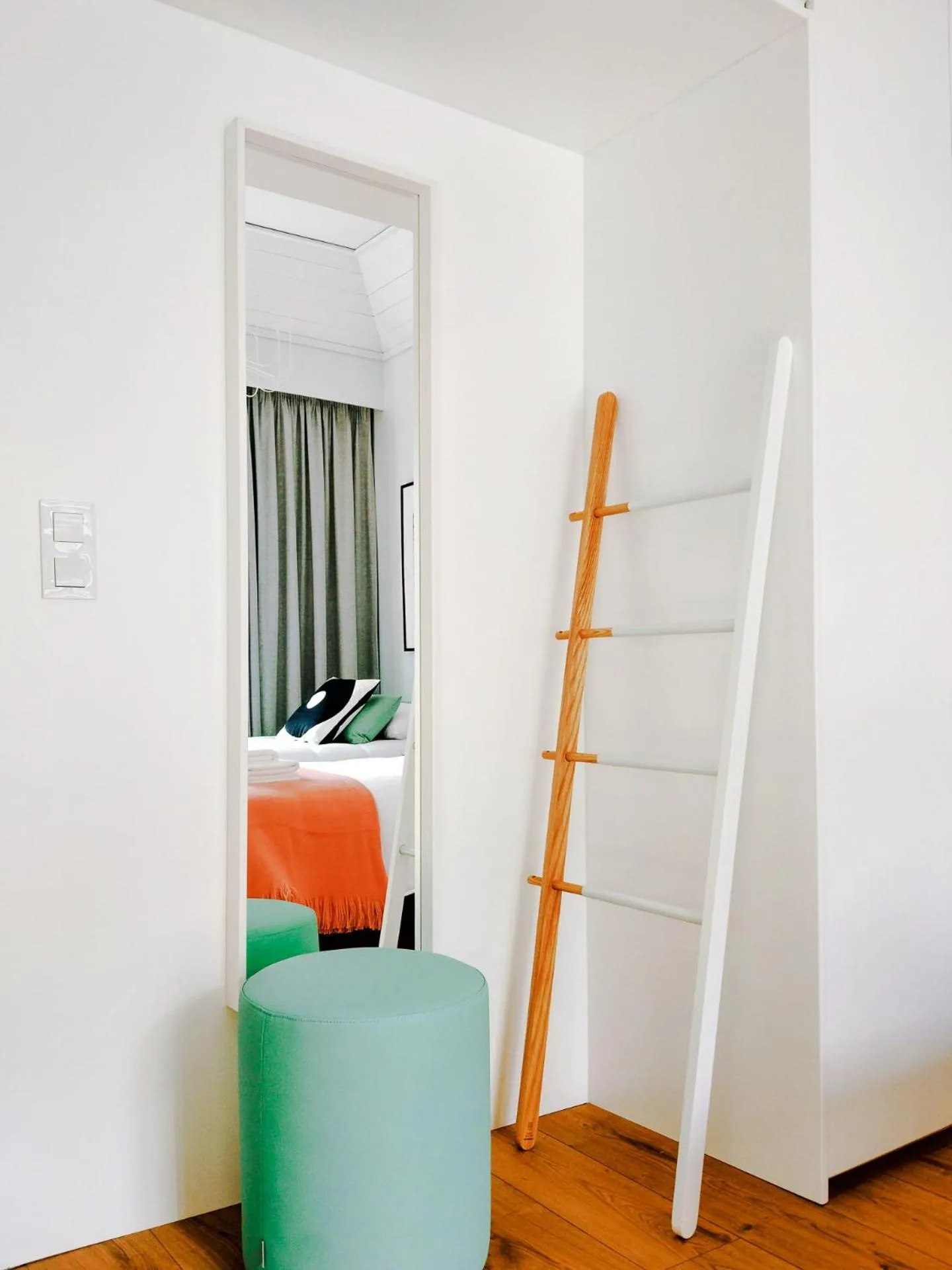 Bed in NLC Rooms & Suites