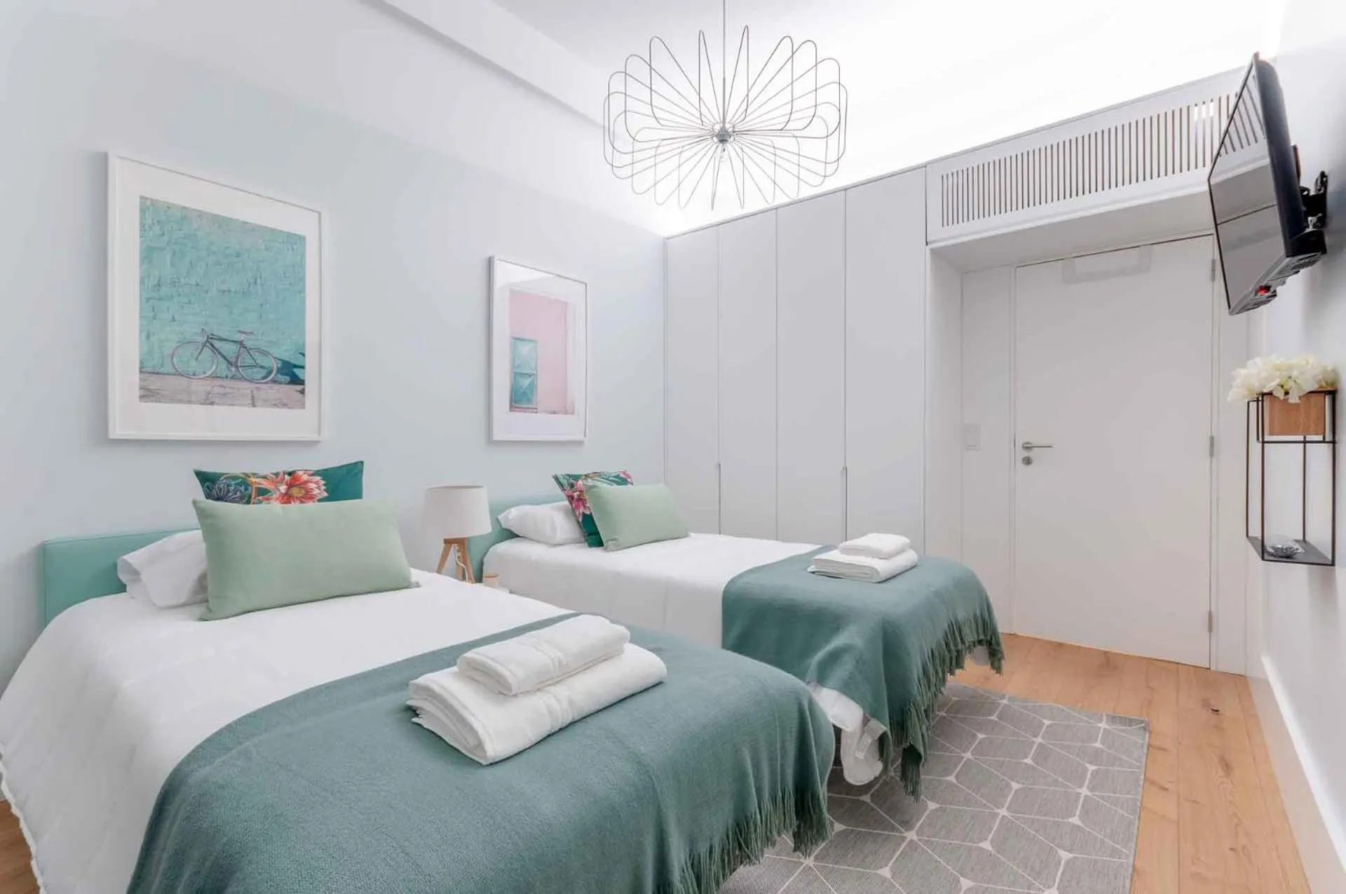 Bed in NLC Rooms & Suites