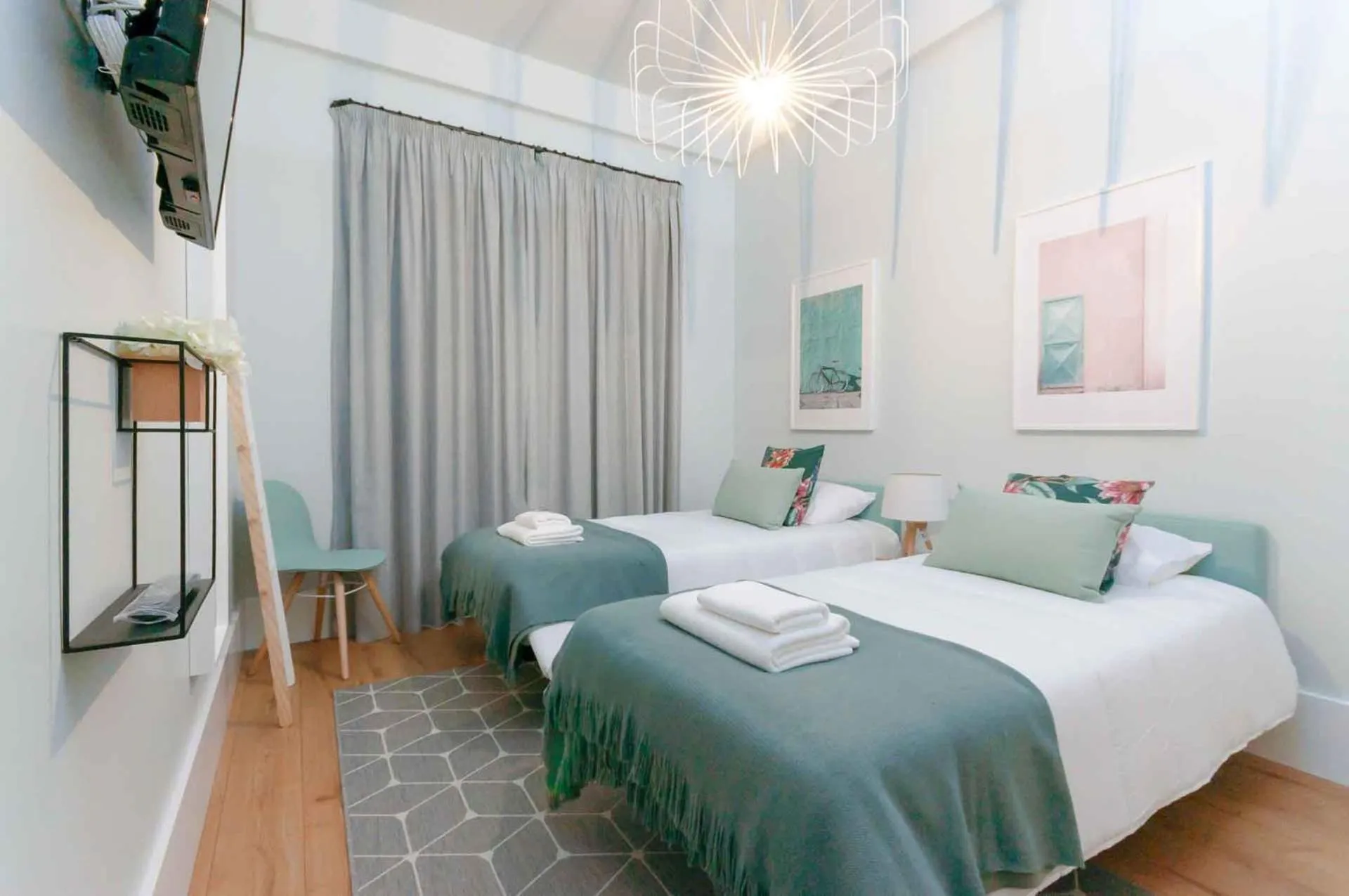 Bed in NLC Rooms & Suites