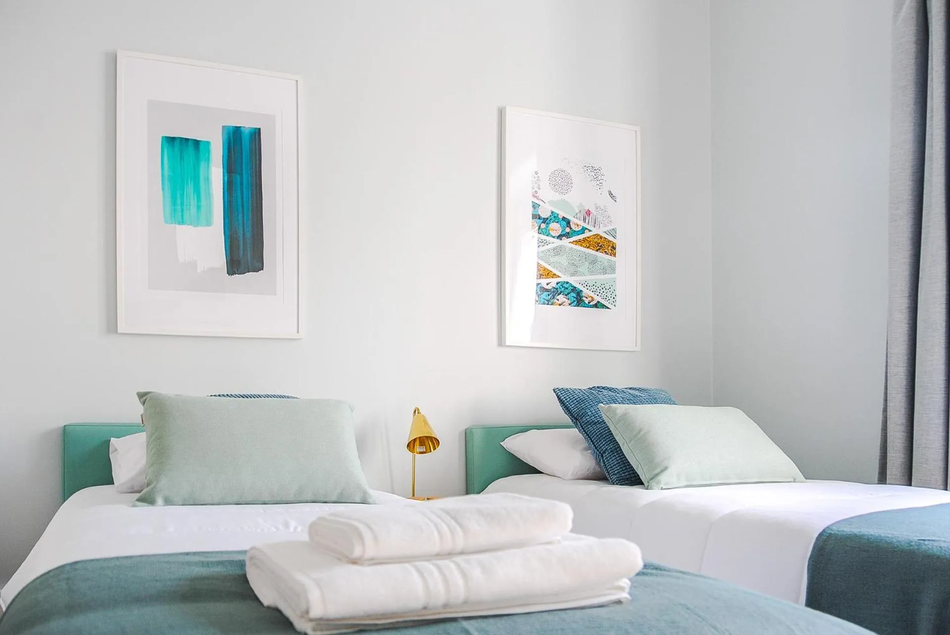 Bed in NLC Rooms & Suites