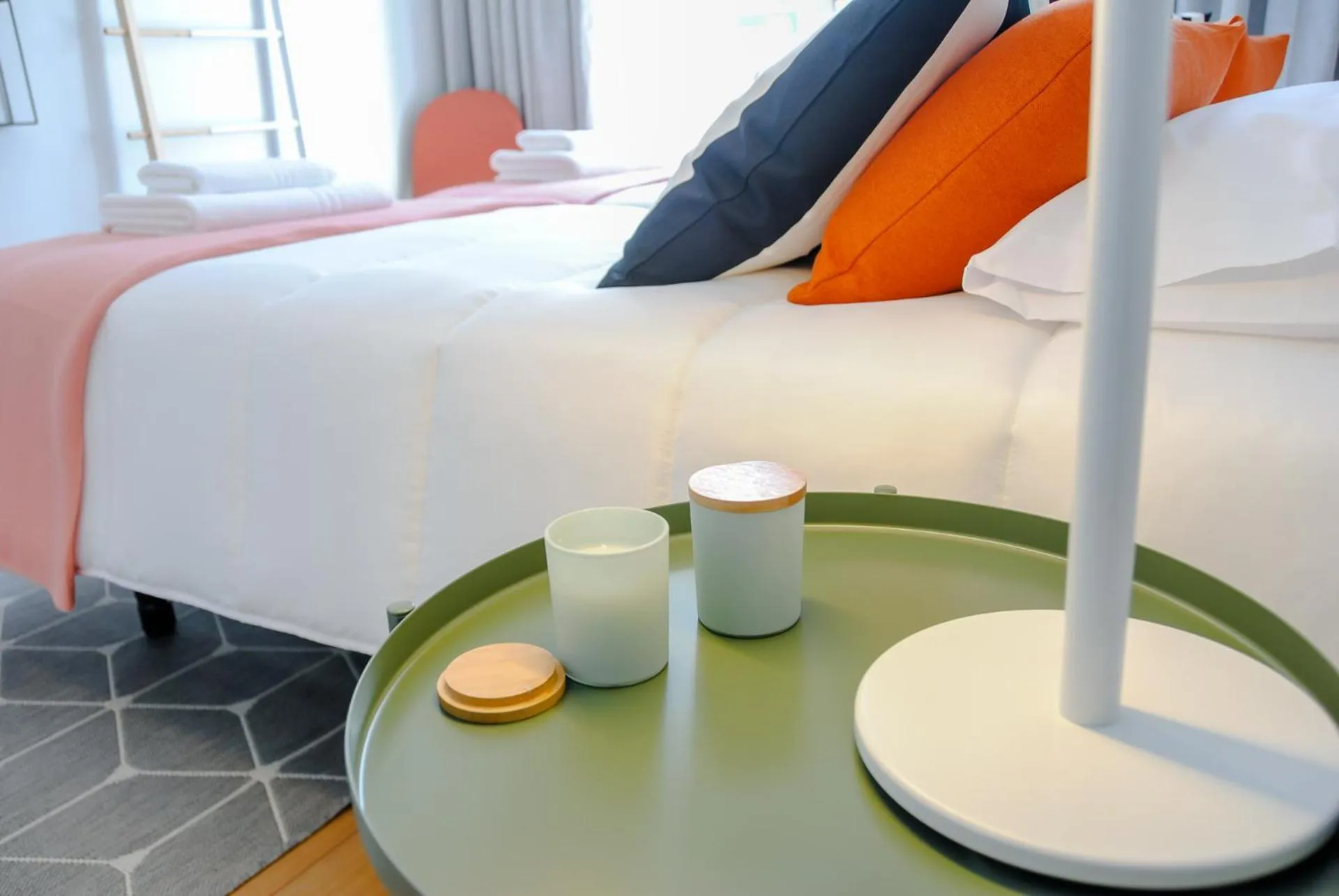 Bed in NLC Rooms & Suites