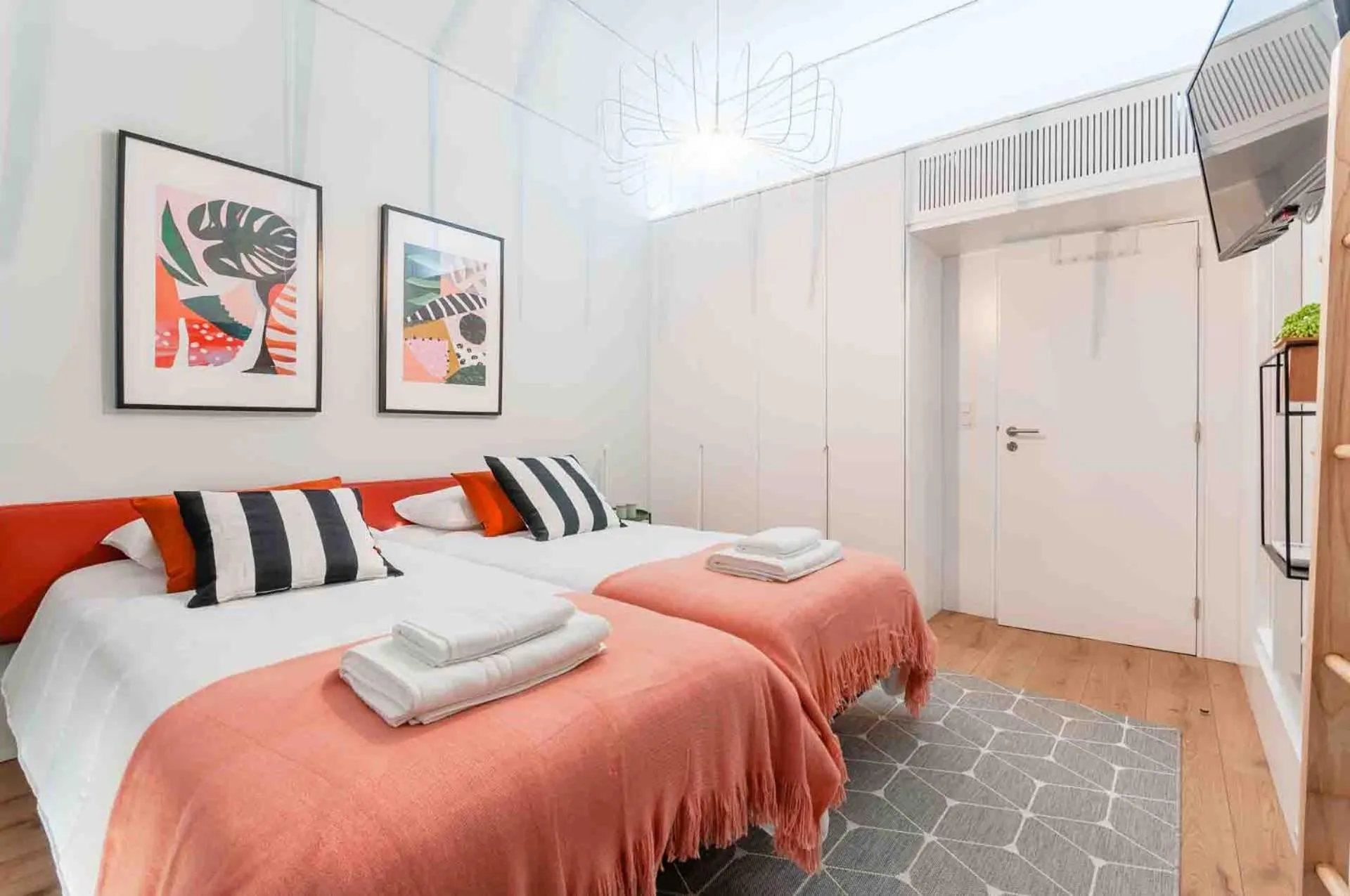 Bed in NLC Rooms & Suites