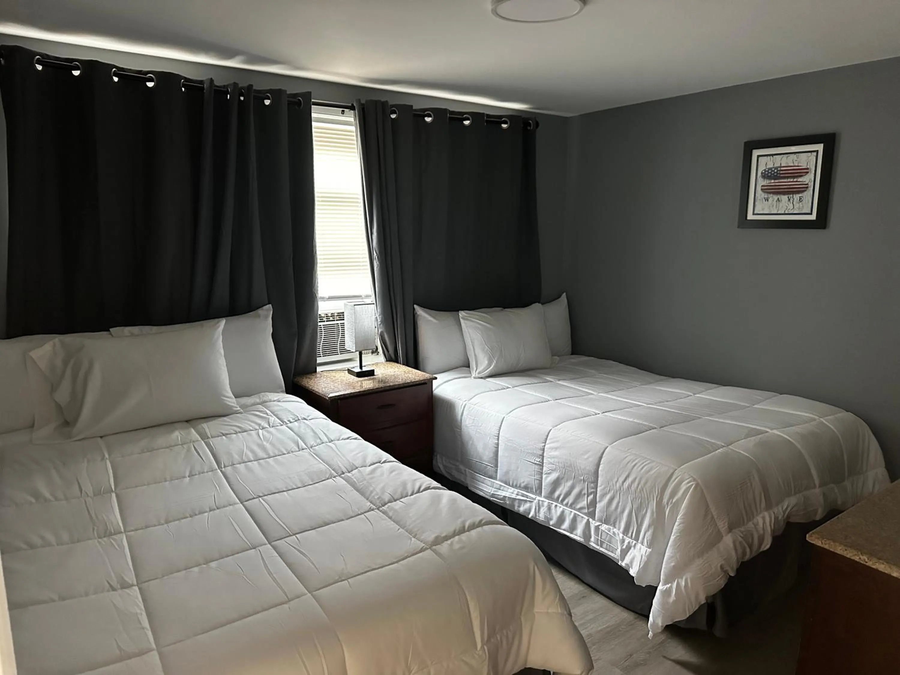 Bed in Atlantic Breeze Motel & Apartments