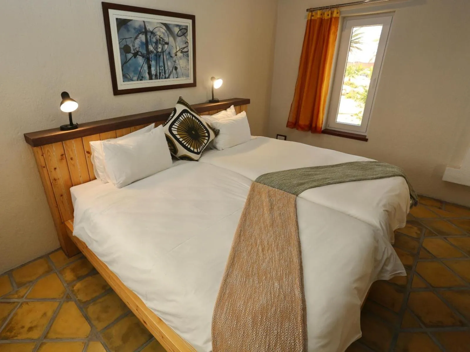 Bed in Desert Breeze Lodge