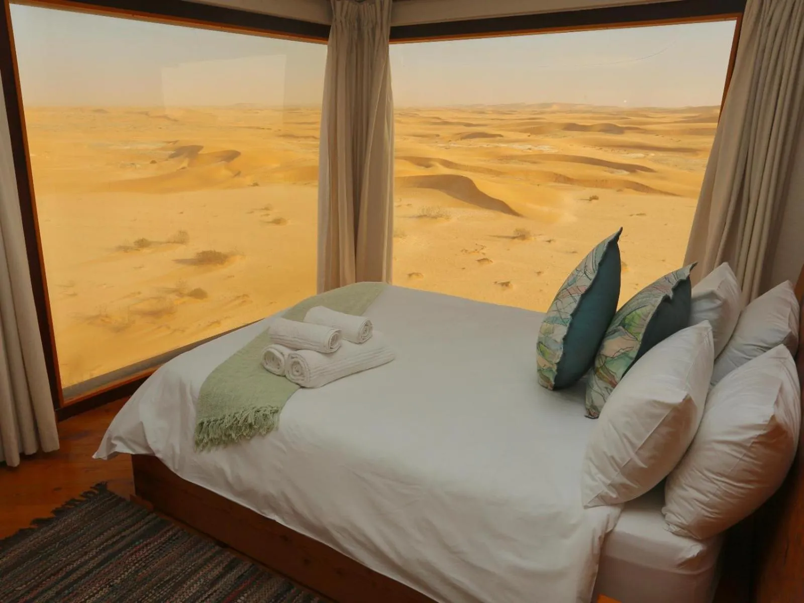 Bed in Desert Breeze Lodge