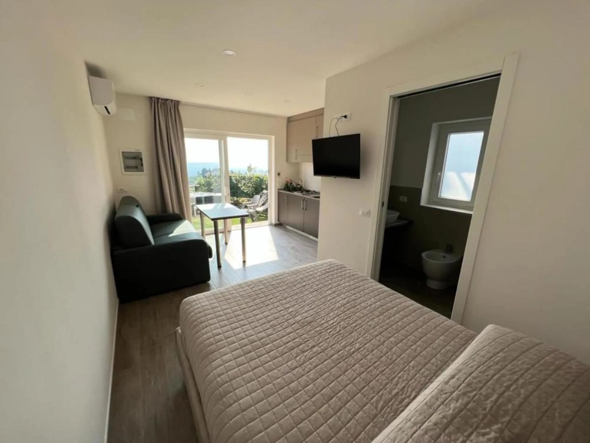 Living room, Bed in Camping Village Panoramico Fiesole