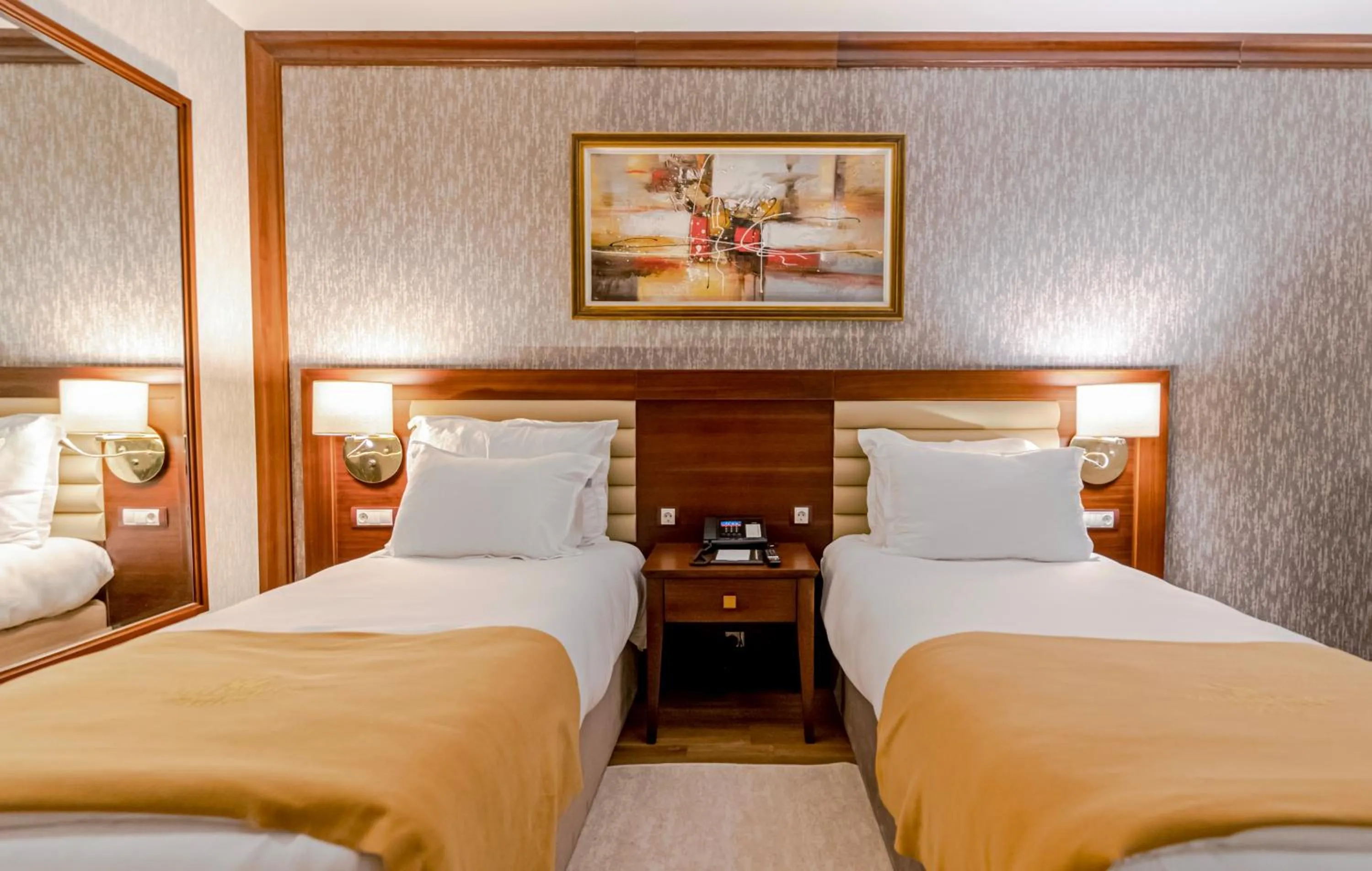 Bed in Wellborn Luxury Hotel