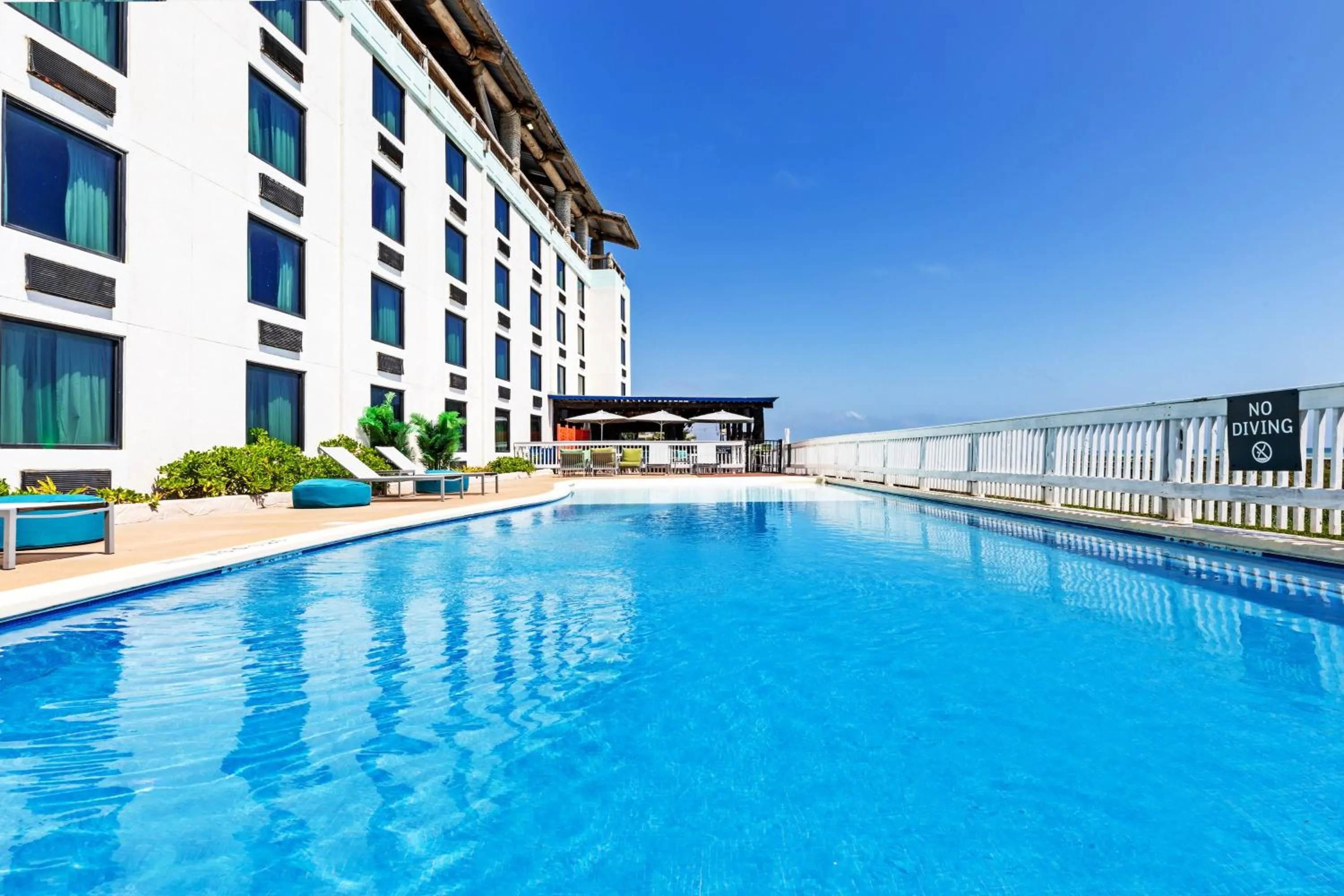 Swimming pool in Holiday Inn Resort South Padre Island-Beach Front by IHG