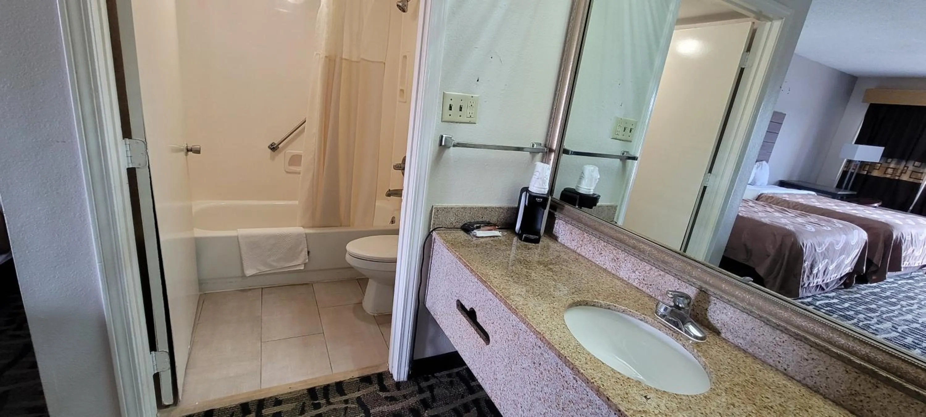 Bathroom, Bed in Motel 6-Maryland Heights, MO