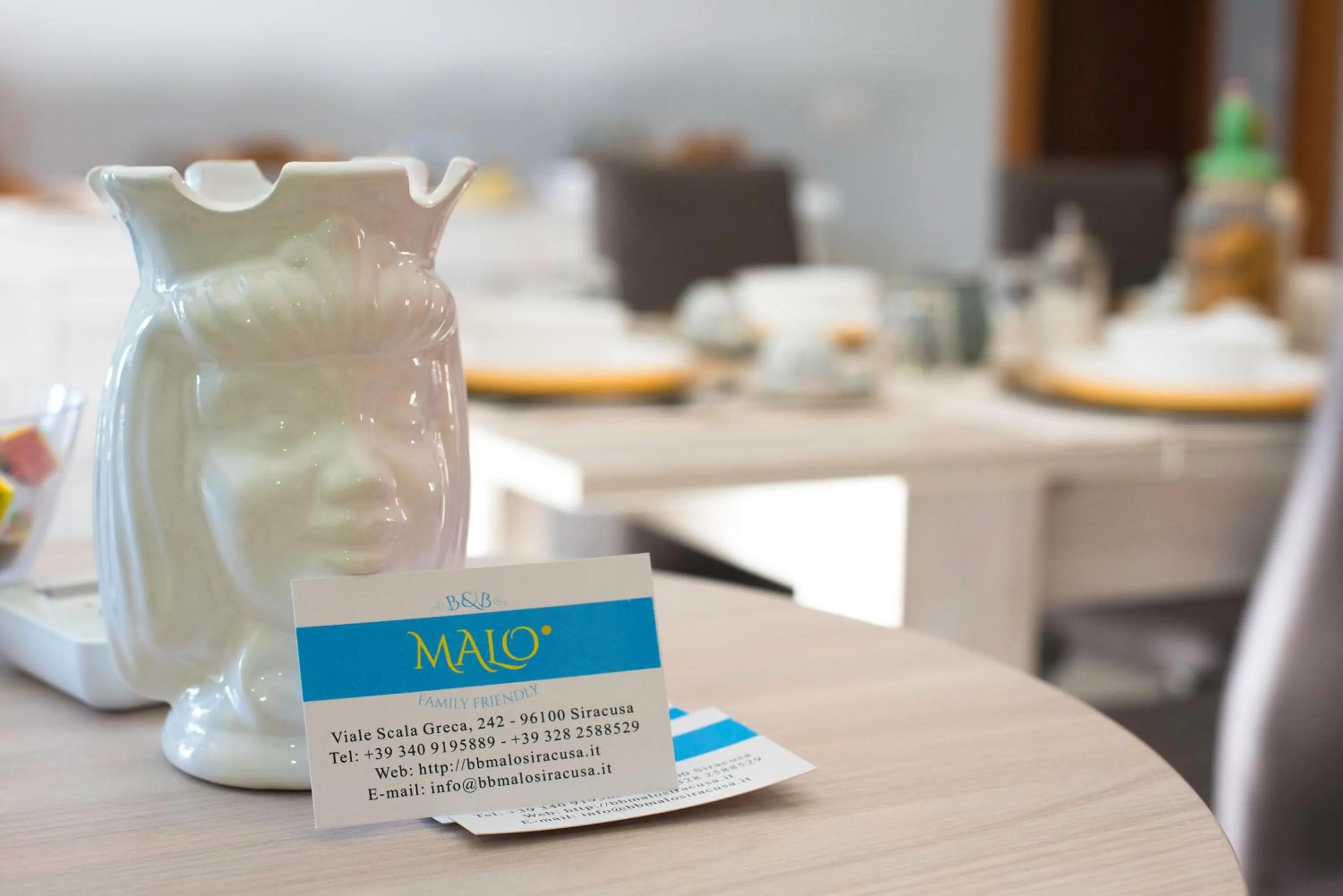 Communal lounge/ TV room in B&B MaLò Family Friendly