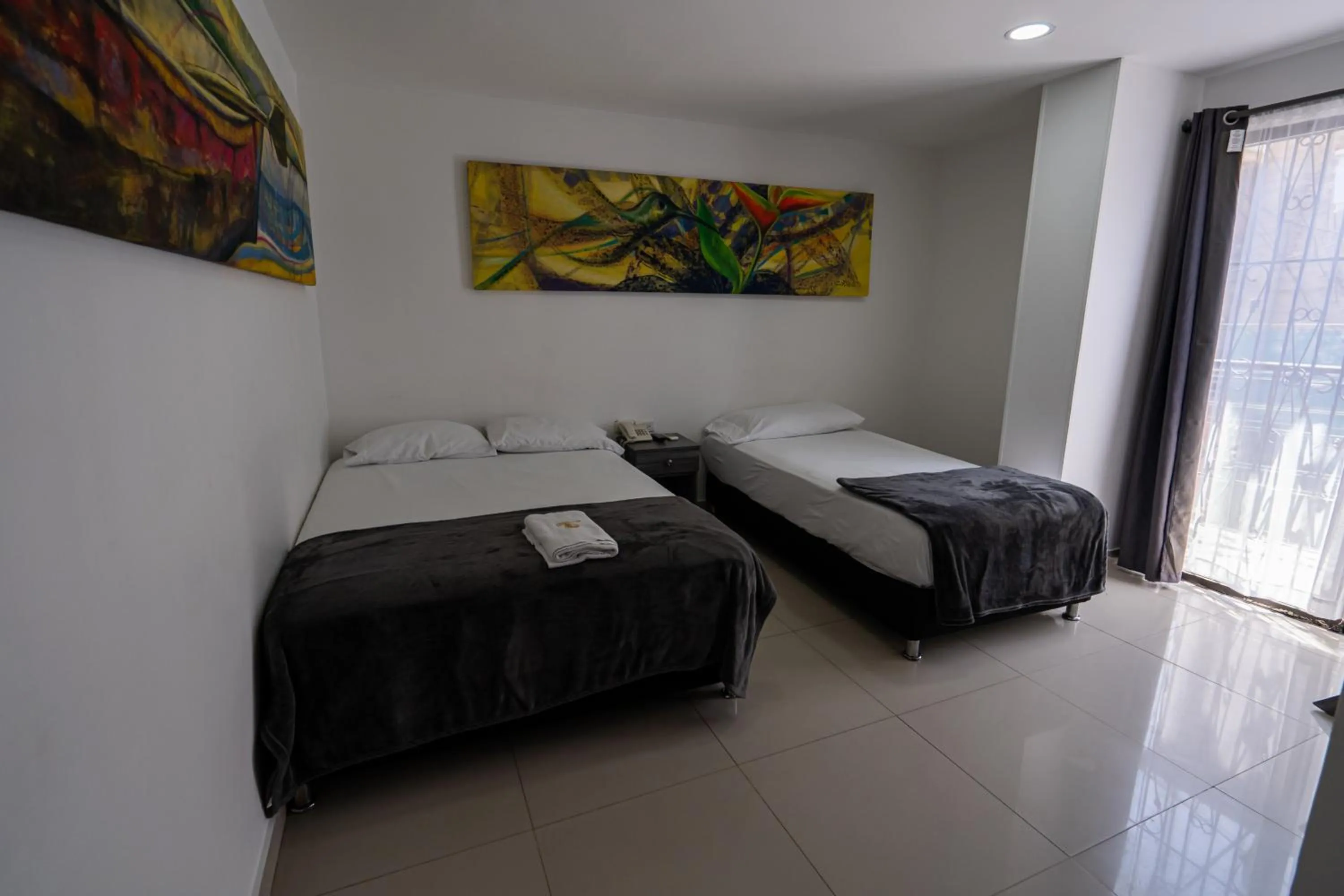 Bed in Hotel Tayromar