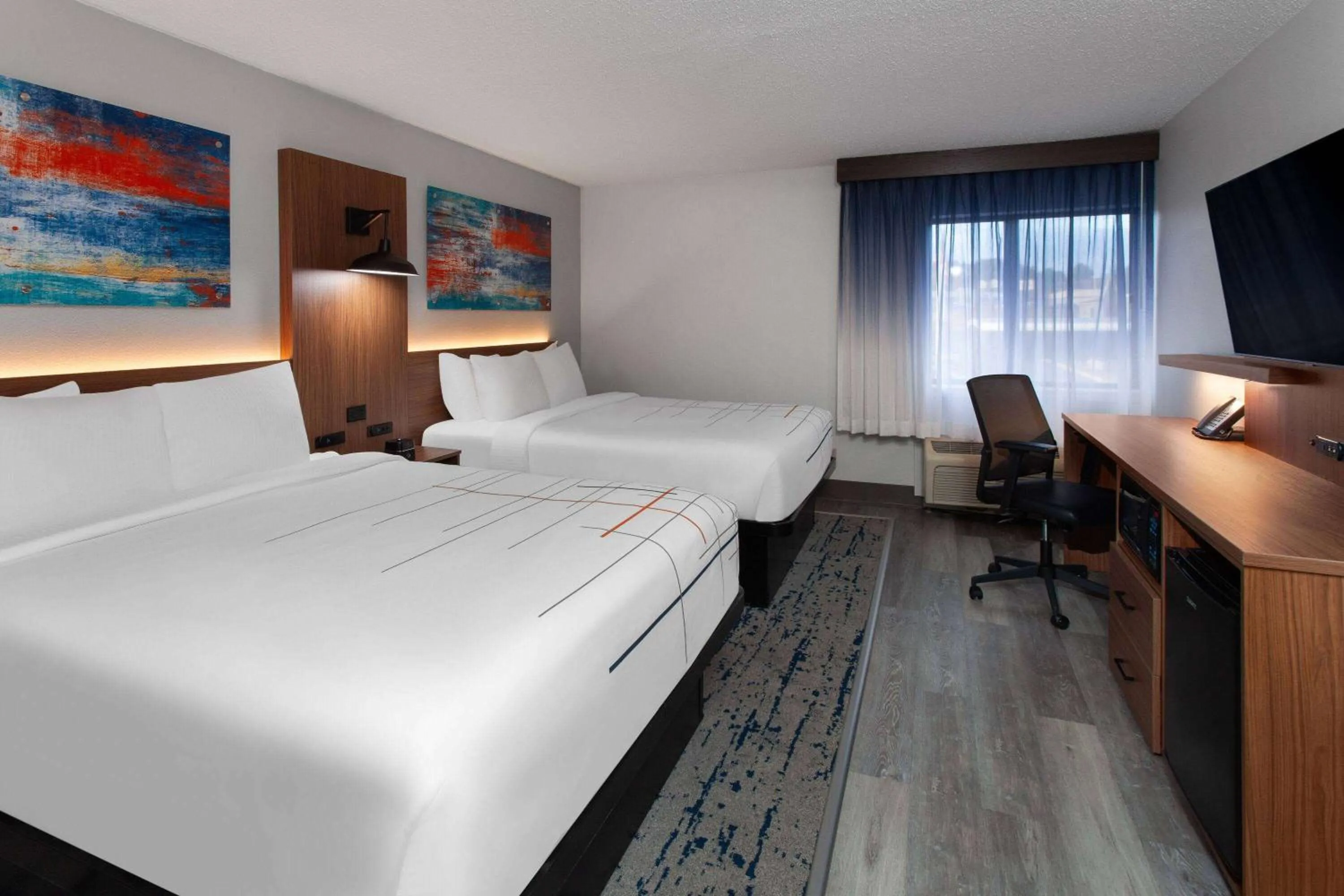 Bed in La Quinta Inn by Wyndham Wausau