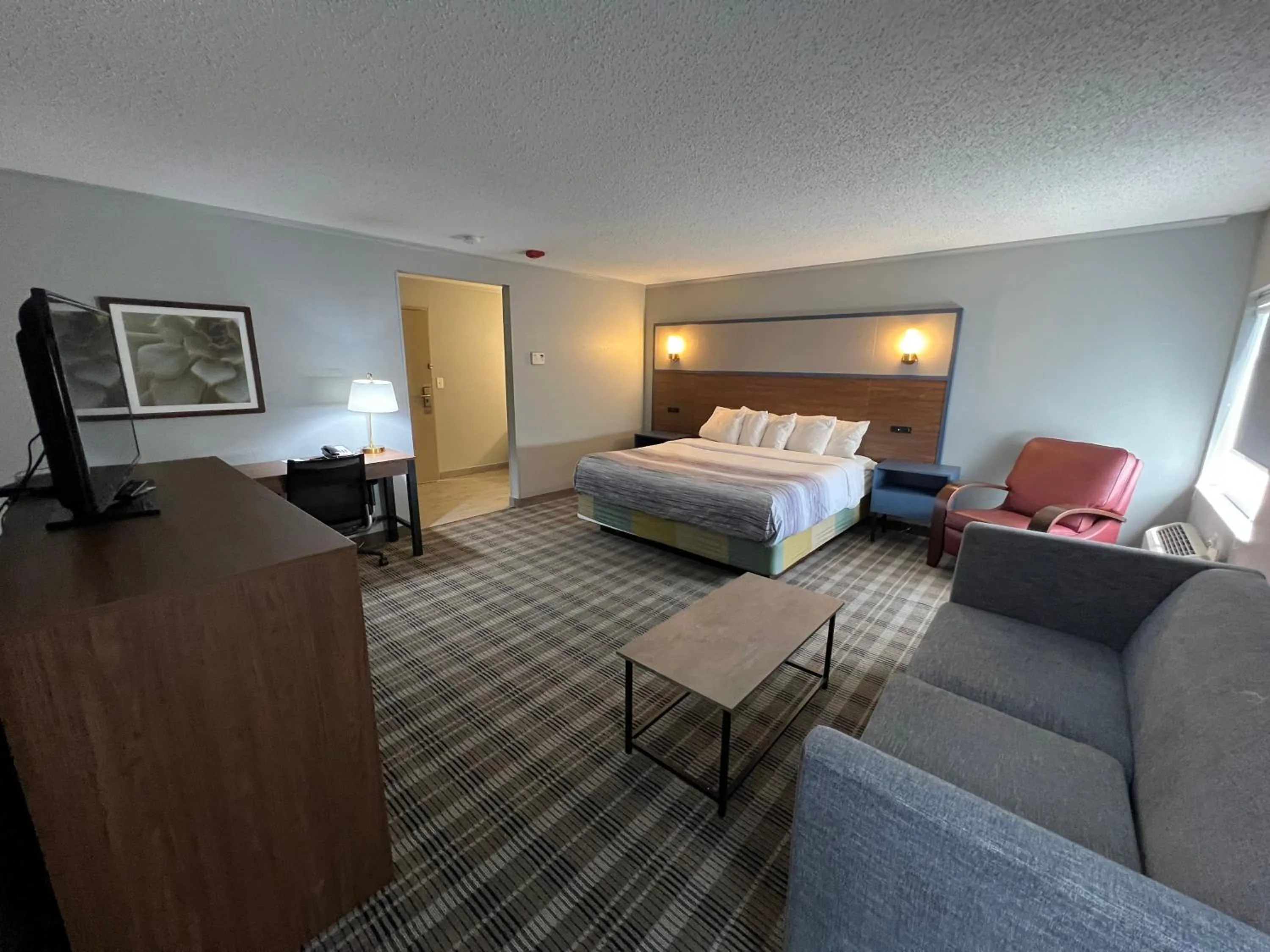 Photo of the whole room, Bed in AmericInn by Wyndham Glendale Milwaukee