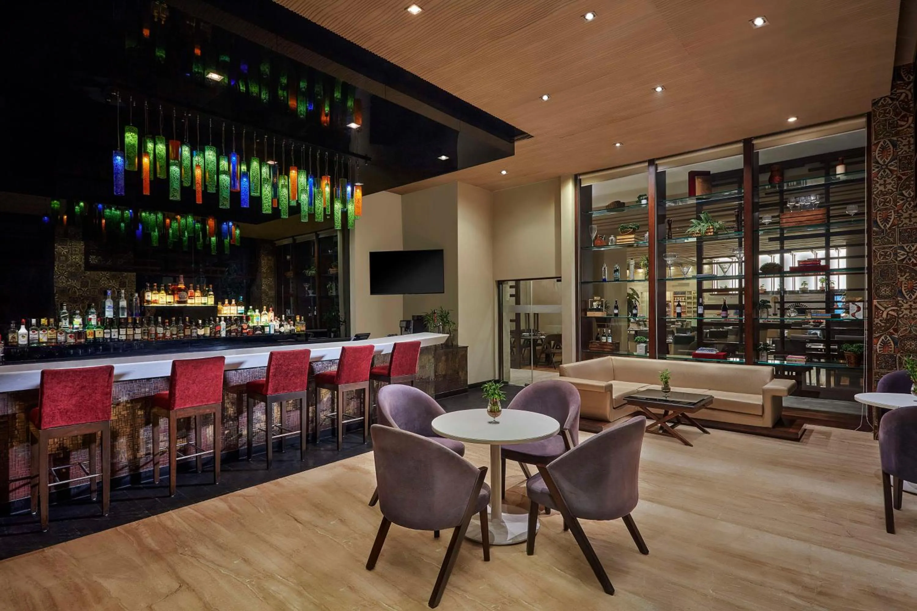 Lounge or bar in DoubleTree by Hilton Gurugram Baani Square
