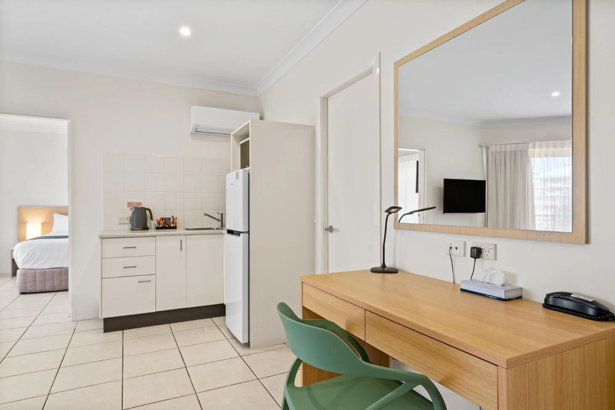 Kitchen or kitchenette in Terrigal Sails Serviced Apartments