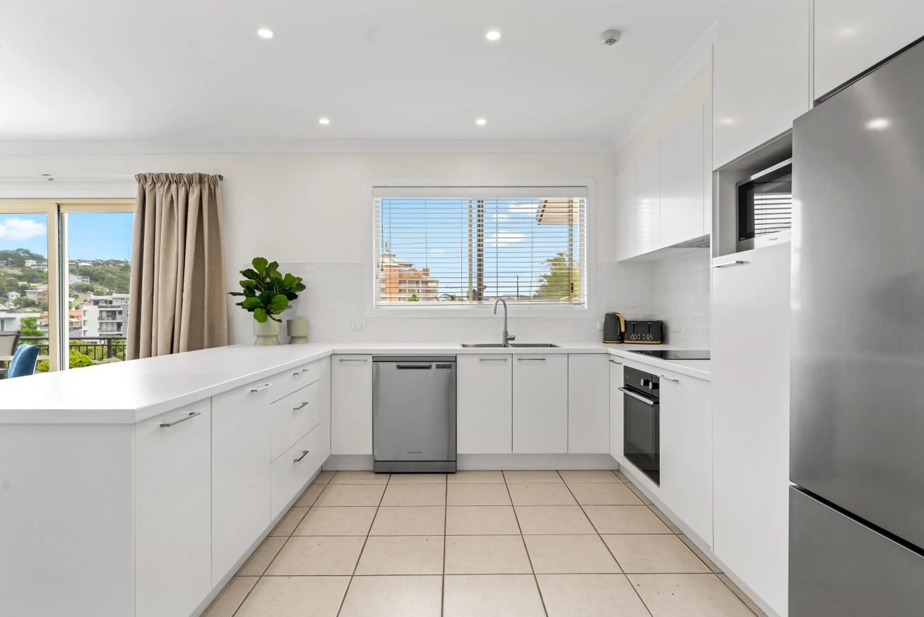 kitchen in Terrigal Sails Serviced Apartments