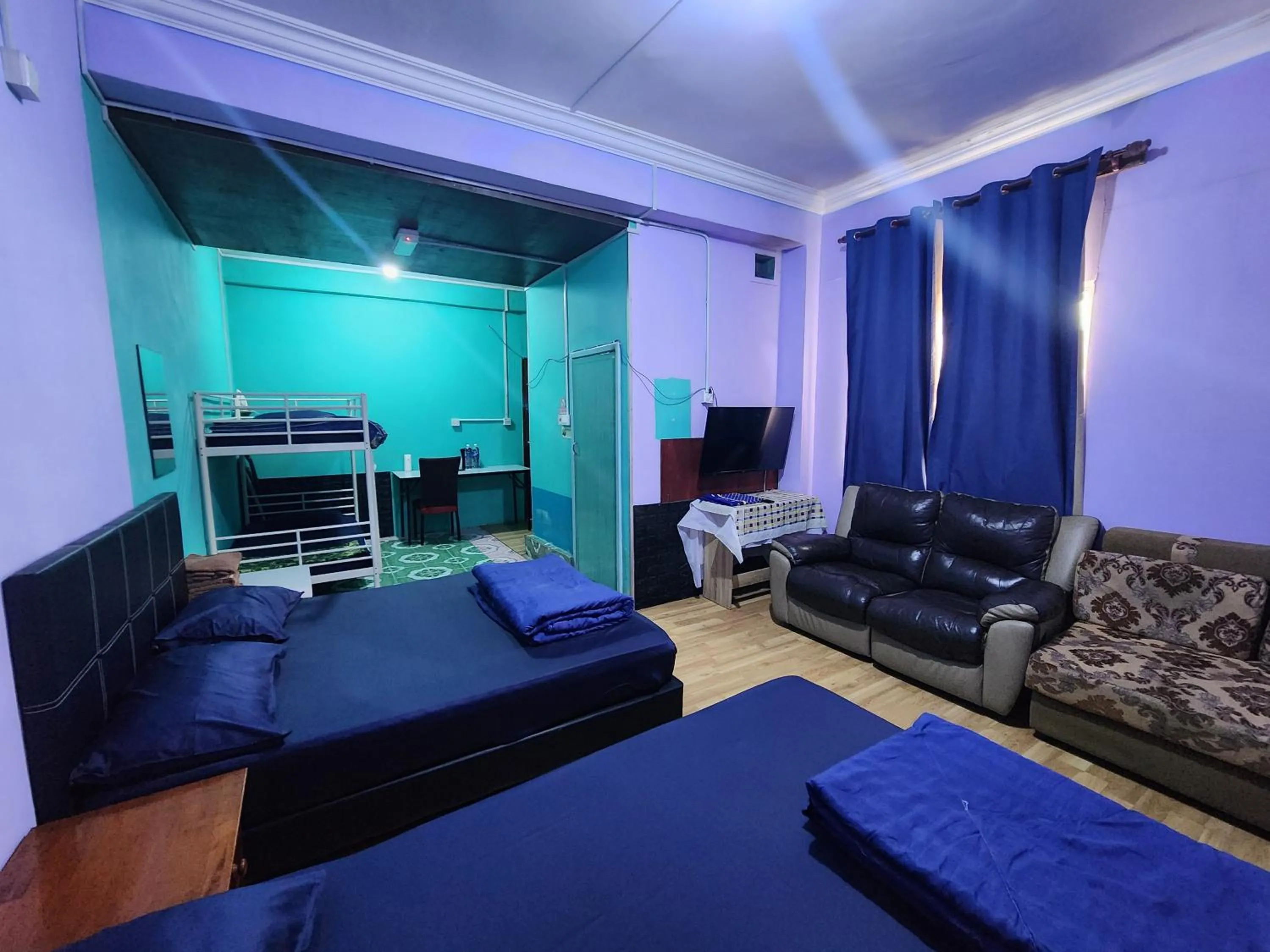 Communal lounge/ TV room in Kupi-Kupi & Stay